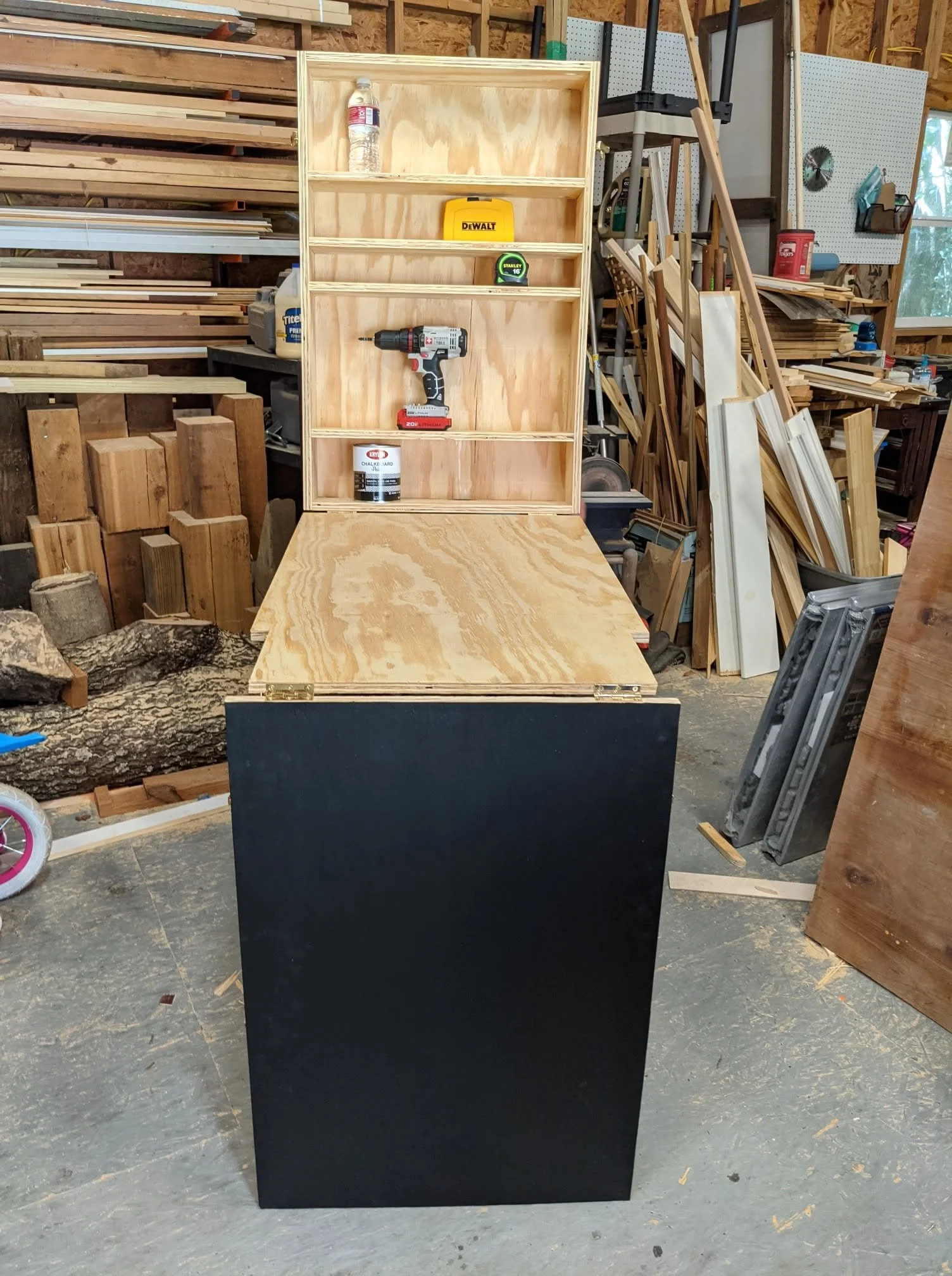 Fold down work bench with magnetic chalboard face