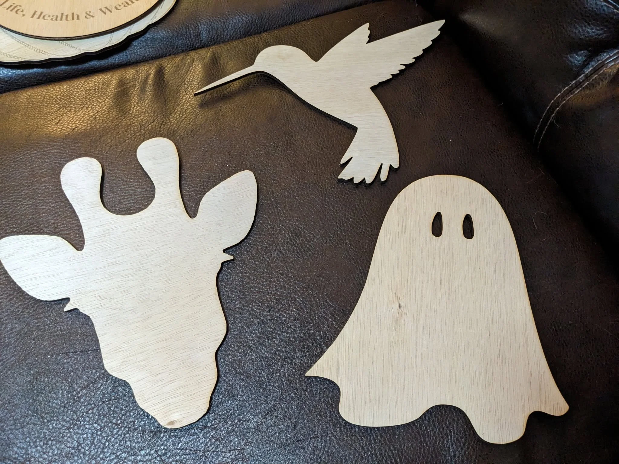 Giant wooden cut outs for a wreath making business