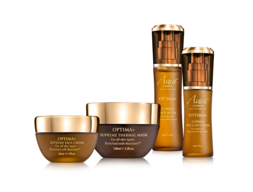 Skincare products including Optima Supreme Face Cream, Supreme Thermal Mask, and eye and lip cream bottles.