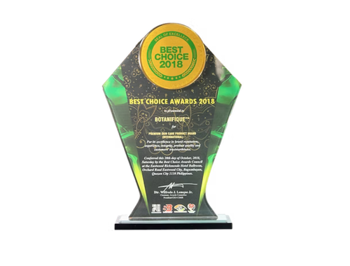 Award trophy with a green and yellow top label reading 'Best Choice 2018', with gold accents and a black base, recognizing BotaniFique at the 2018 Best Choice Awards.