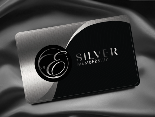 Black and silver Silver Membership card on a silky fabric background.