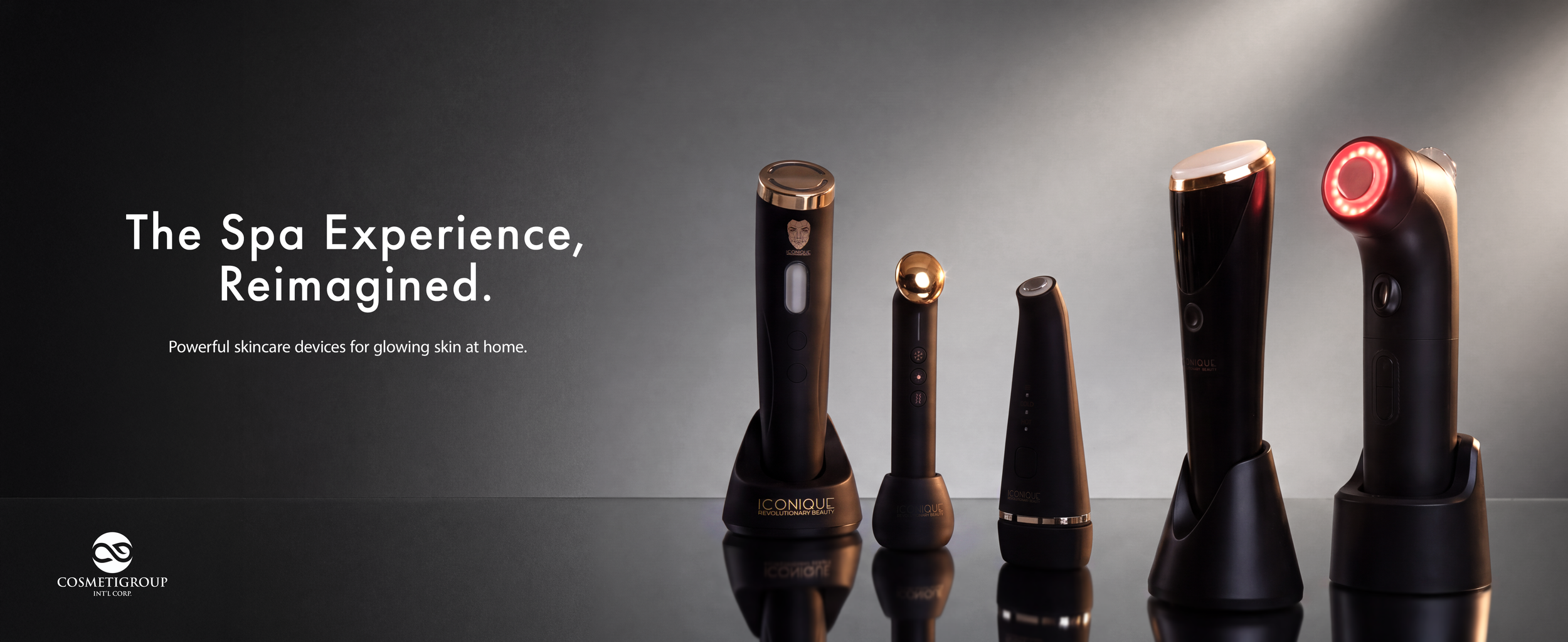 A lineup of advanced skincare devices with black and gold accents placed on a reflective surface, accompanied by the text "The Spa Experience, Reimagined." and a subtext about skincare devices for glowing skin at home, with a dark gradient background.
