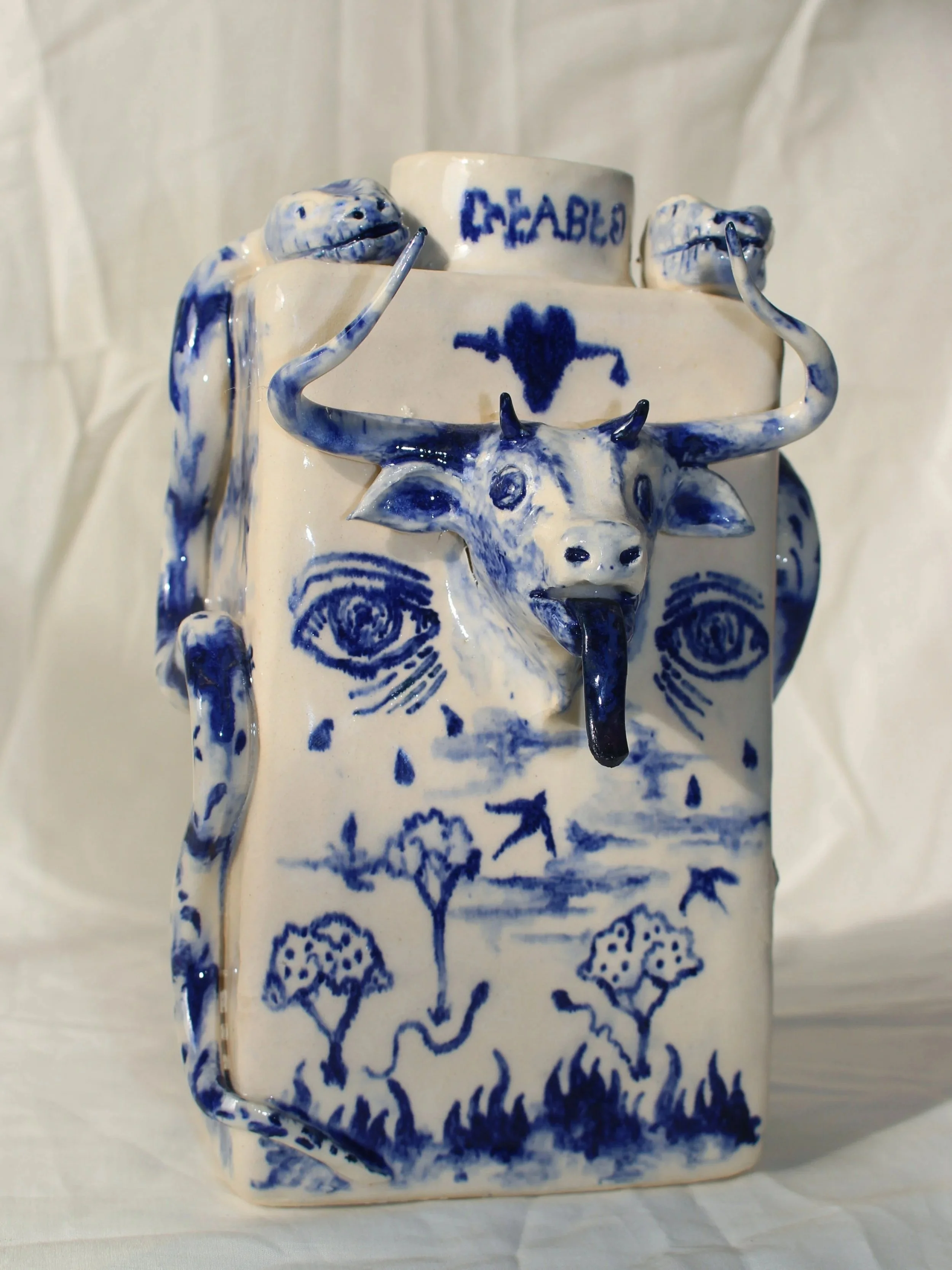 Ceramic art and vase with blue oxide painting detail designed by Anna Fox