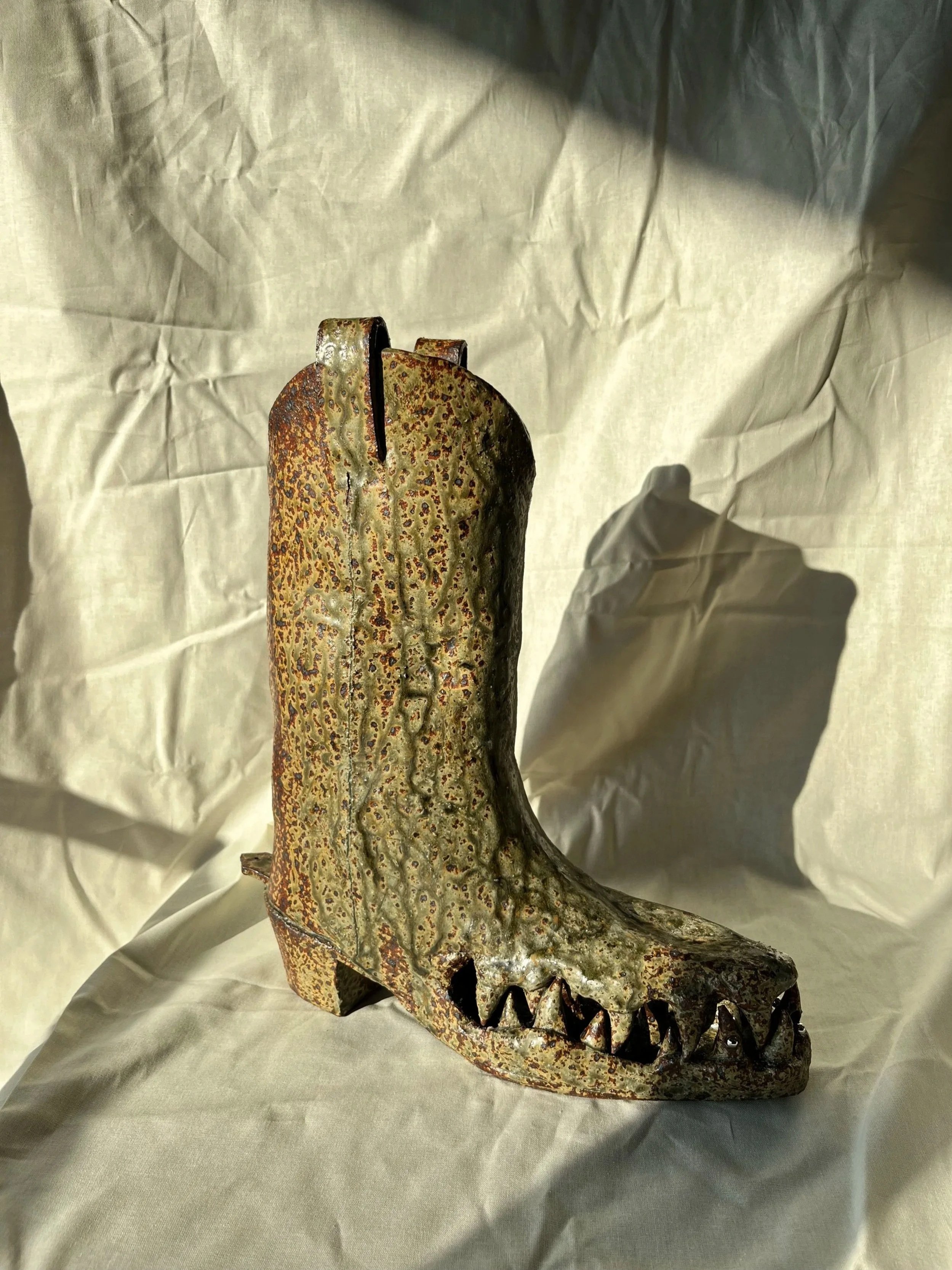 Hand made ceramic cowboy boot designed to be a contemporary design objects