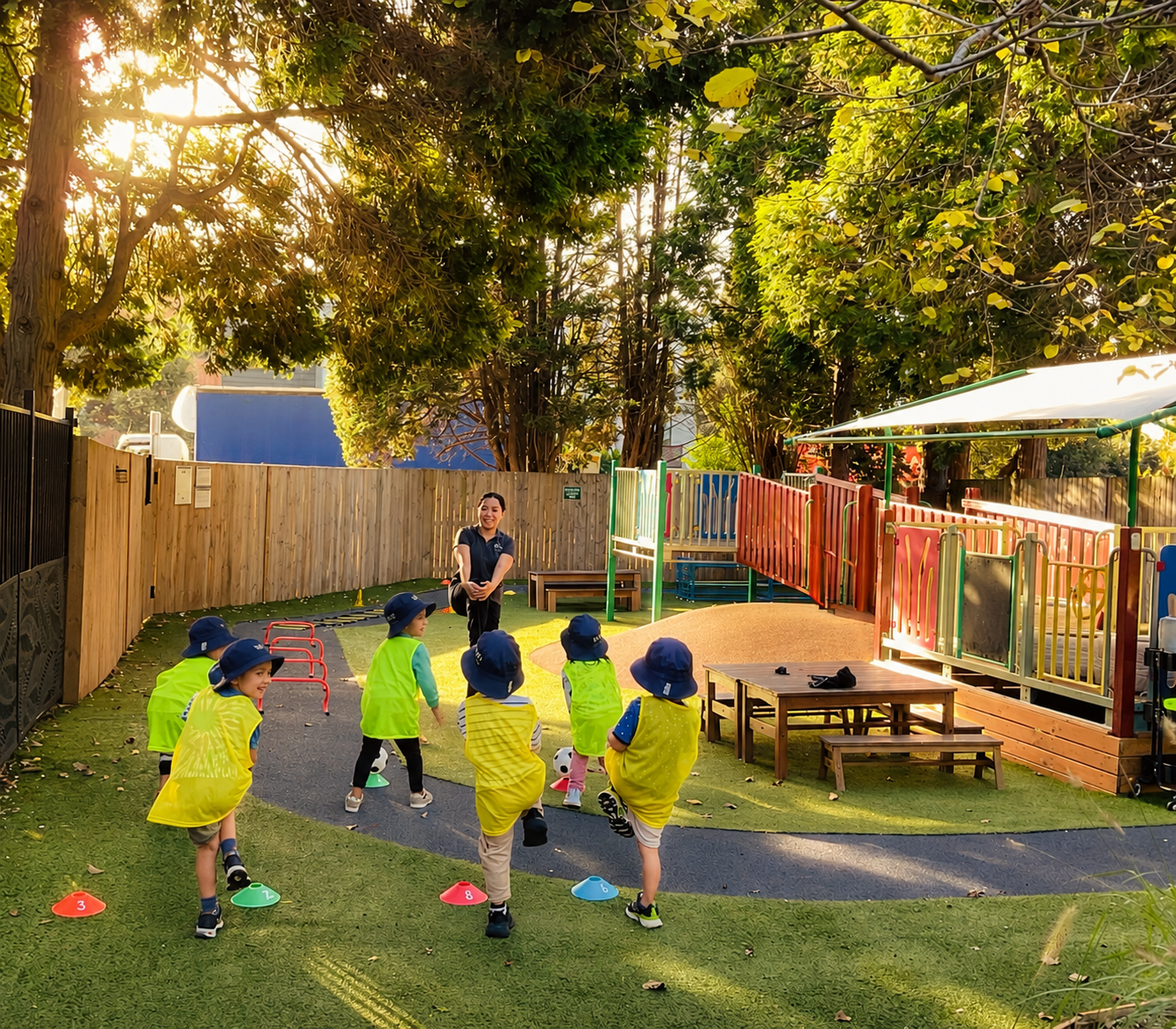 Children exploring outdoors at Kelvin Kindergarten St Ives