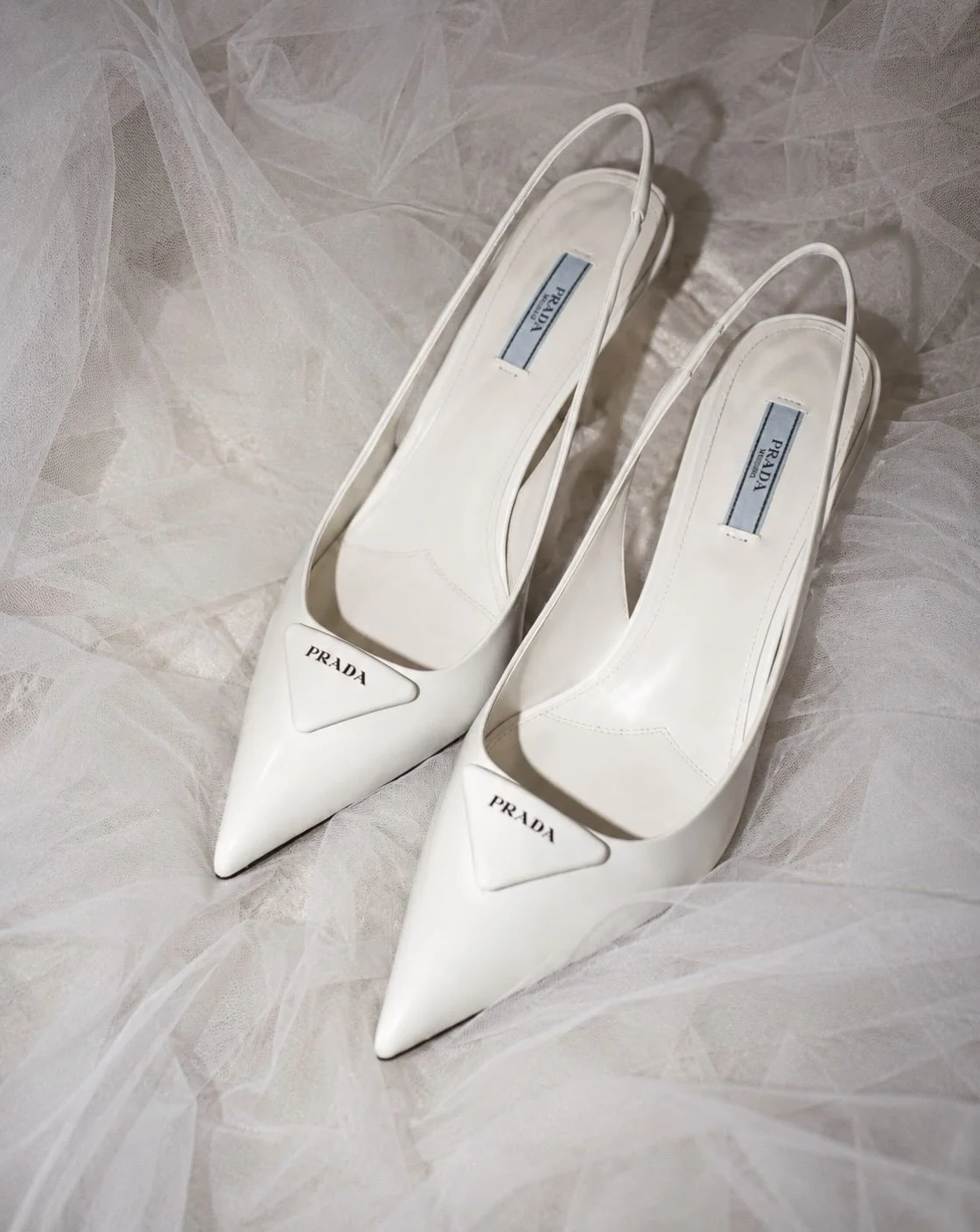 The kind of details that deserve their own moment. Prada, tulle and a little bridal magic