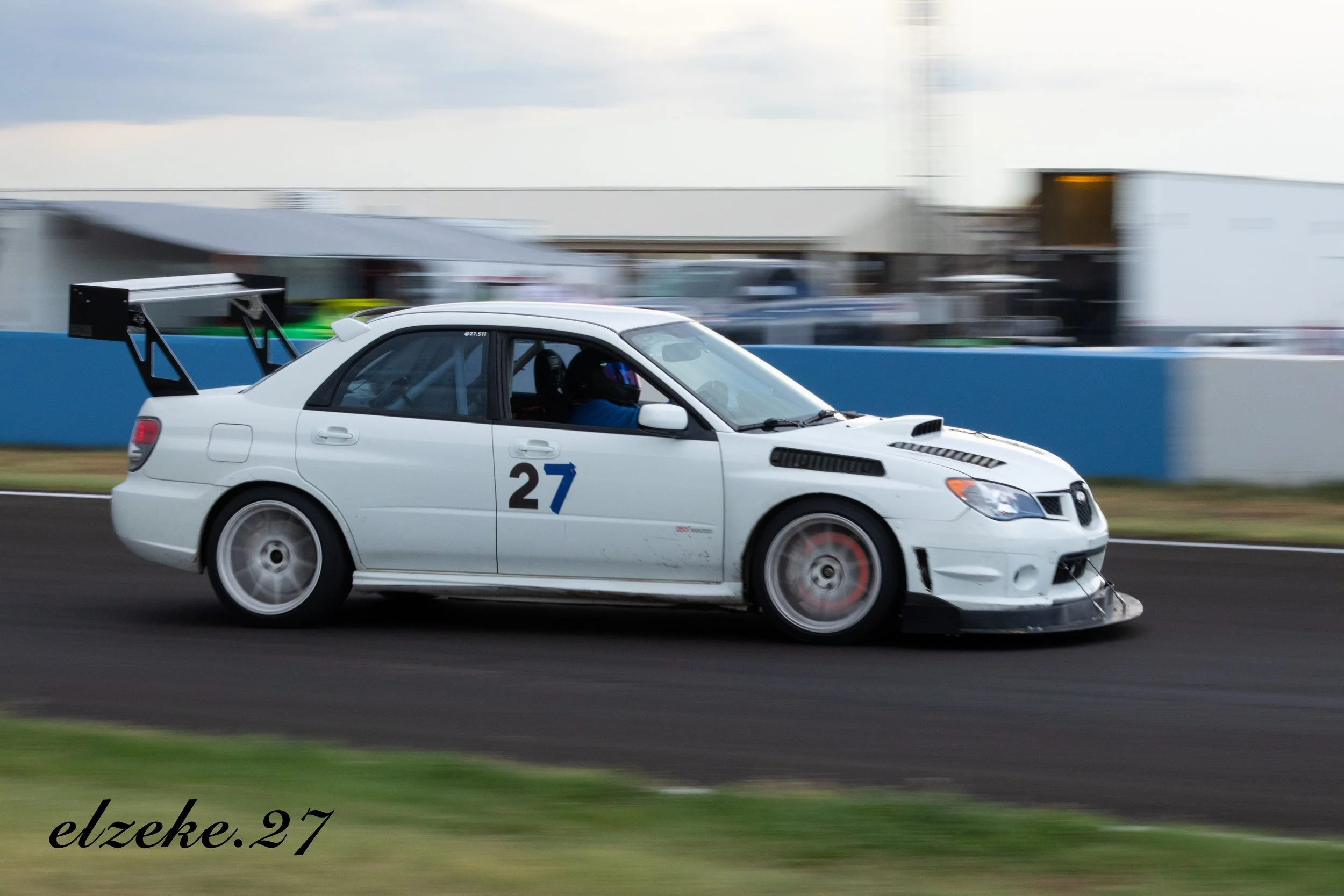 GlowingBrakesSTI.jpeg