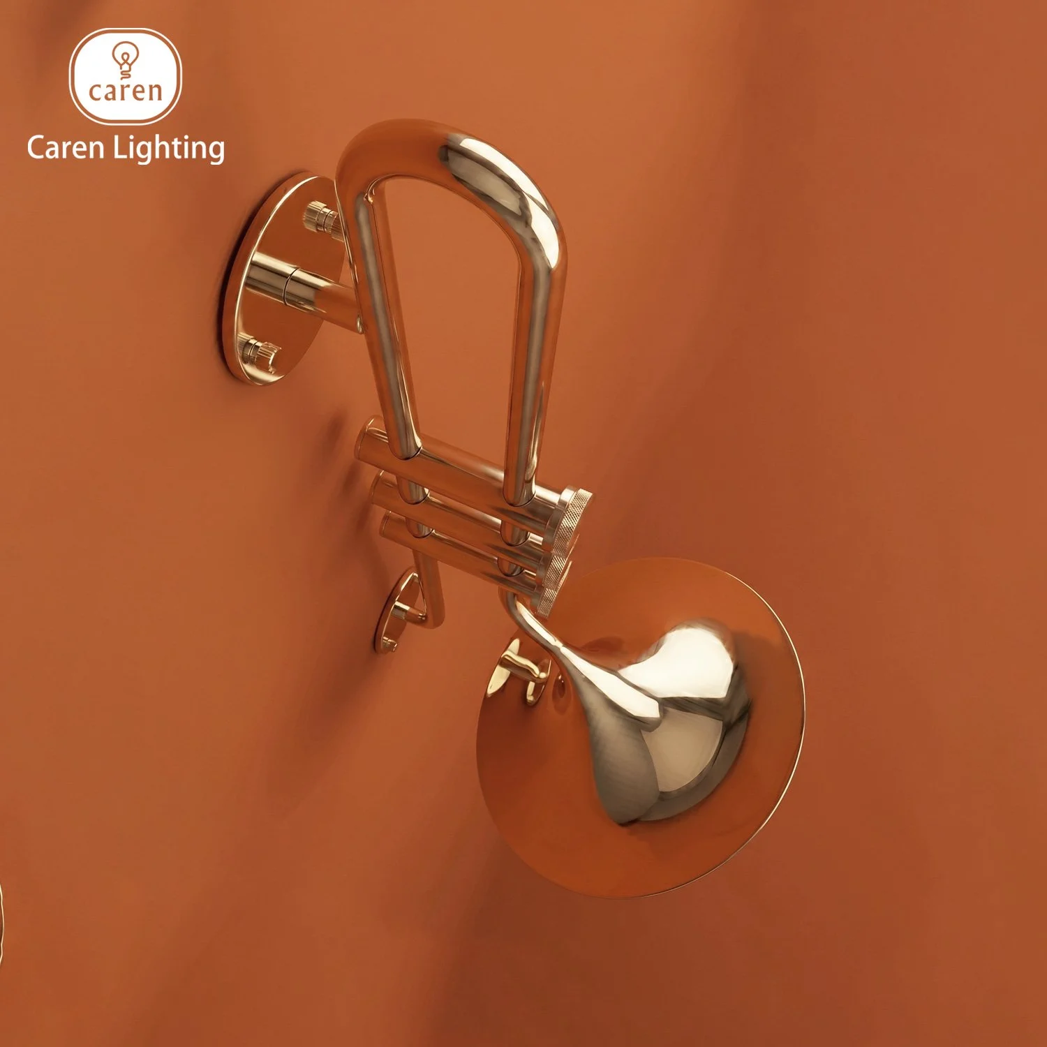 A modern, metallic wall-mounted light fixture with a semi-circular design, mounted on a copper-colored wall. The fixture has a sleek, reflective surface and minimalist appearance.