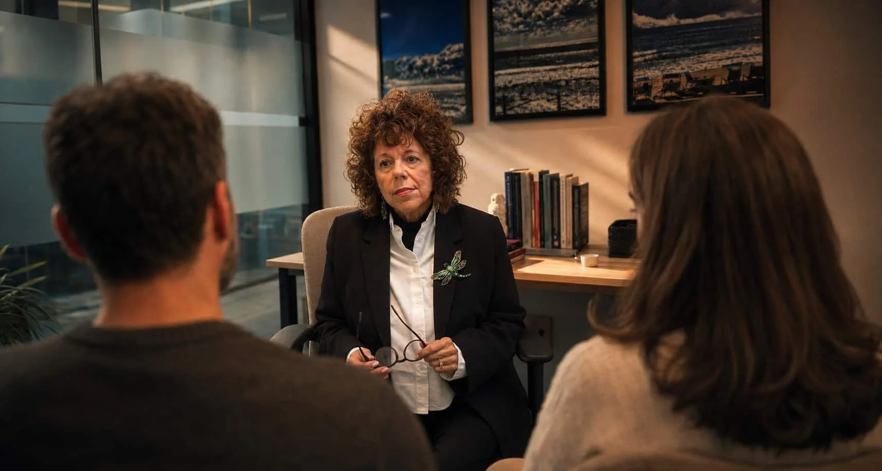Psychologist Jasmine Sliger talking to a couple in her Sydney office.