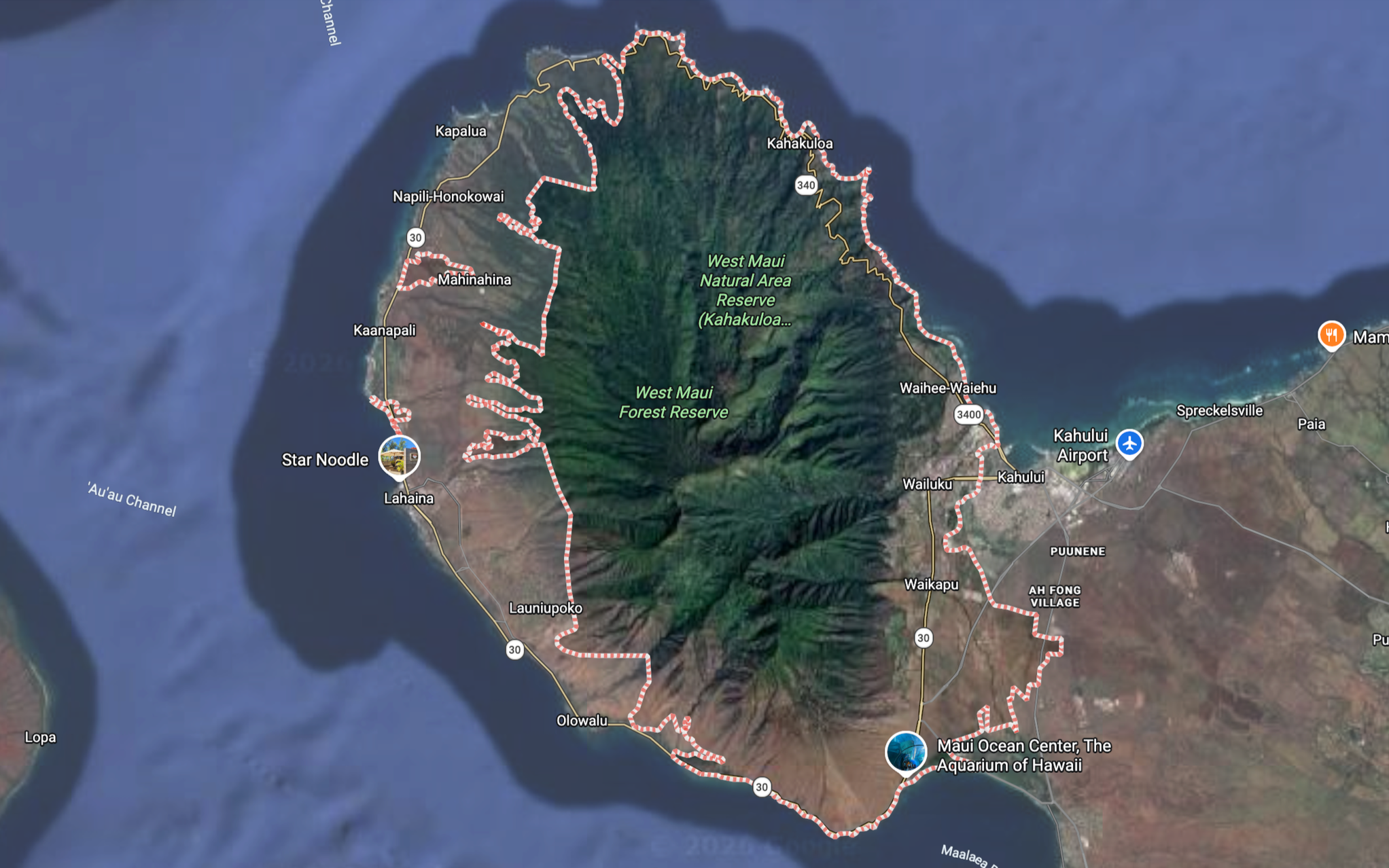 Map of the island of Maui, Hawaii, showing roads, towns, and natural reserves, including West Maui Forest Reserve and West Maui Natural Area Reserve, with a marker at the Maui Ocean Center aquarium.