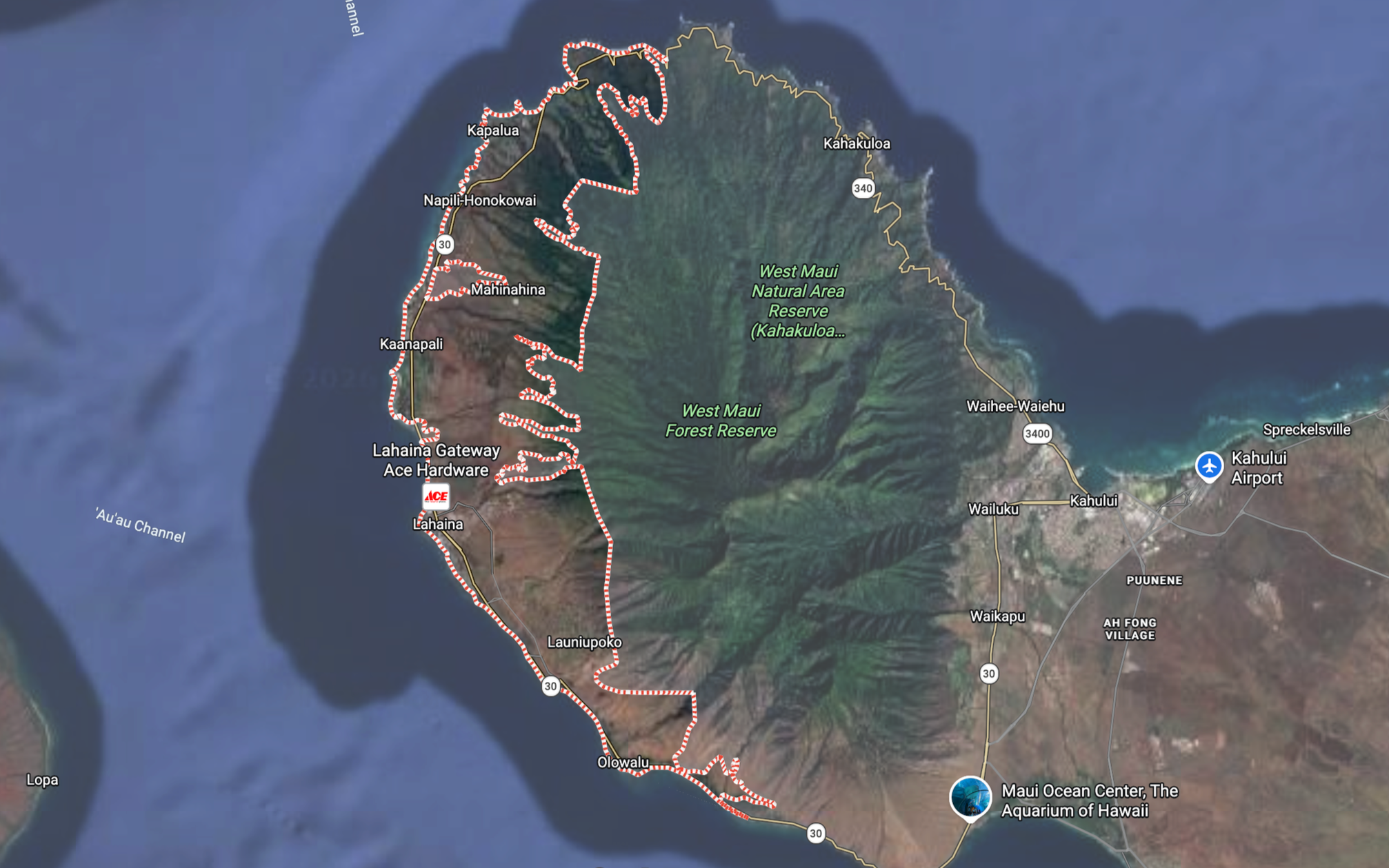 Map of West Maui, Hawaii showing the winding road routes through towns including Lahaina, Kaanapali, Napili-Honokowai, Kapalua, and Olowalu, with surrounding natural areas and the Maui Ocean Center aquarium visible.