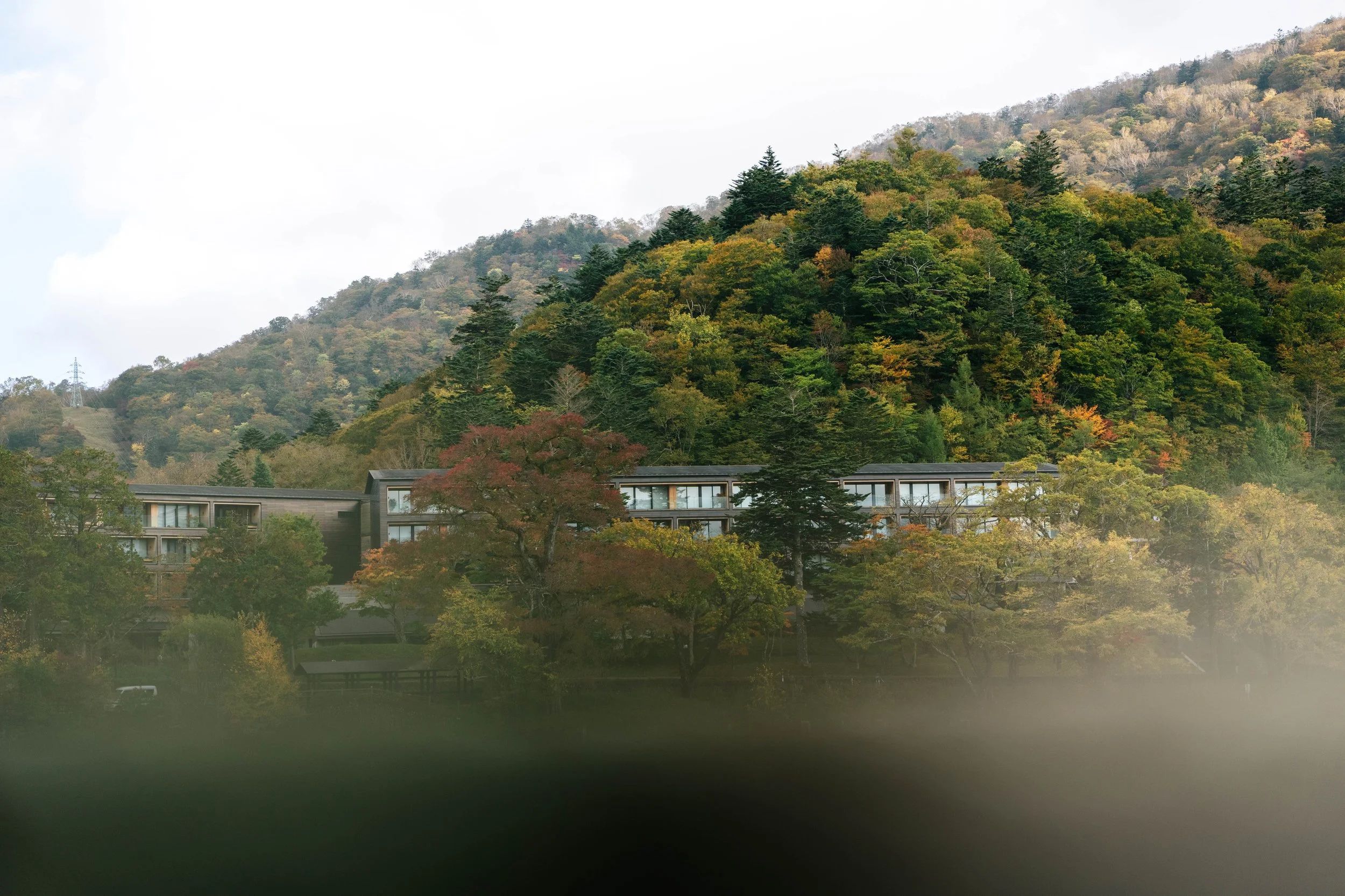 Autumn foliage view of The Ritz-Carlton, Nikko - editorial hotel photography, Japan.