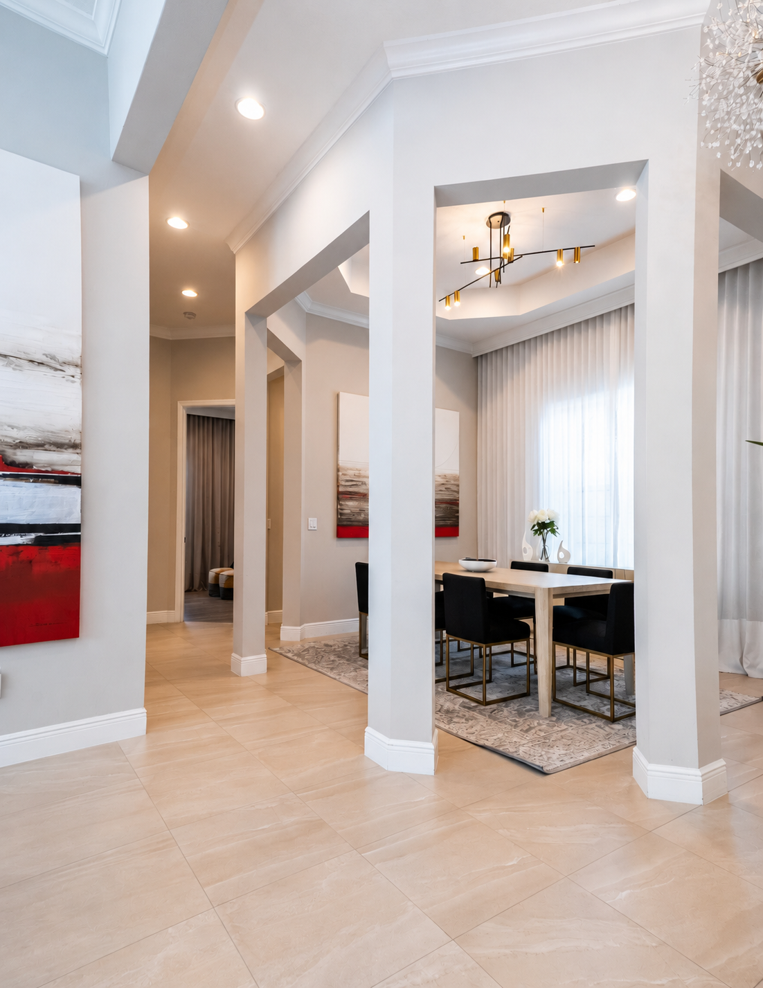 Dining room before renovation, showing the original furniture, finishes and layout prior to the Studio Bortto interior design transformation.