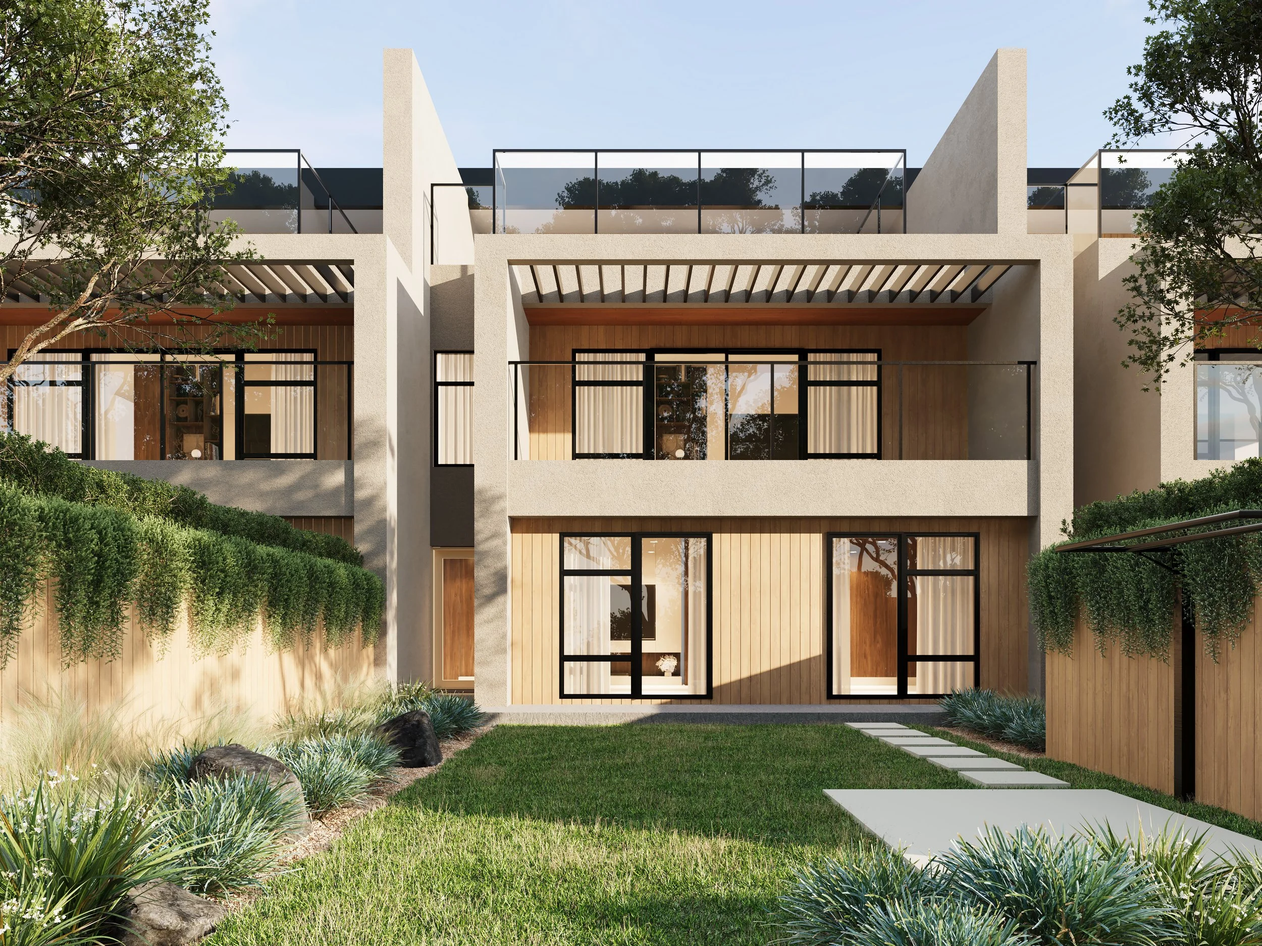 Modern multi-story house with large windows, wooden accents, and balcony, surrounded by greenery and trees.