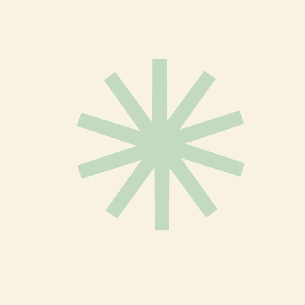 Image d'un fond beige clair avec une étoile verte à 12 branches au centre.