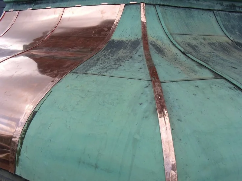 Copper canopy repair (traditional sheet copper work). 