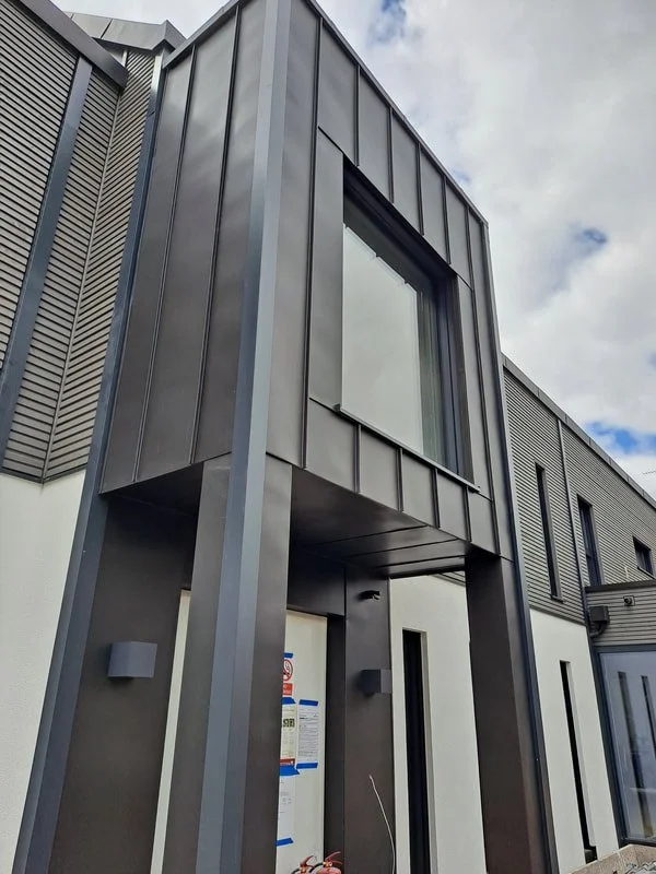 VMZINC Anthra (standing seam) roof and façade cladding.