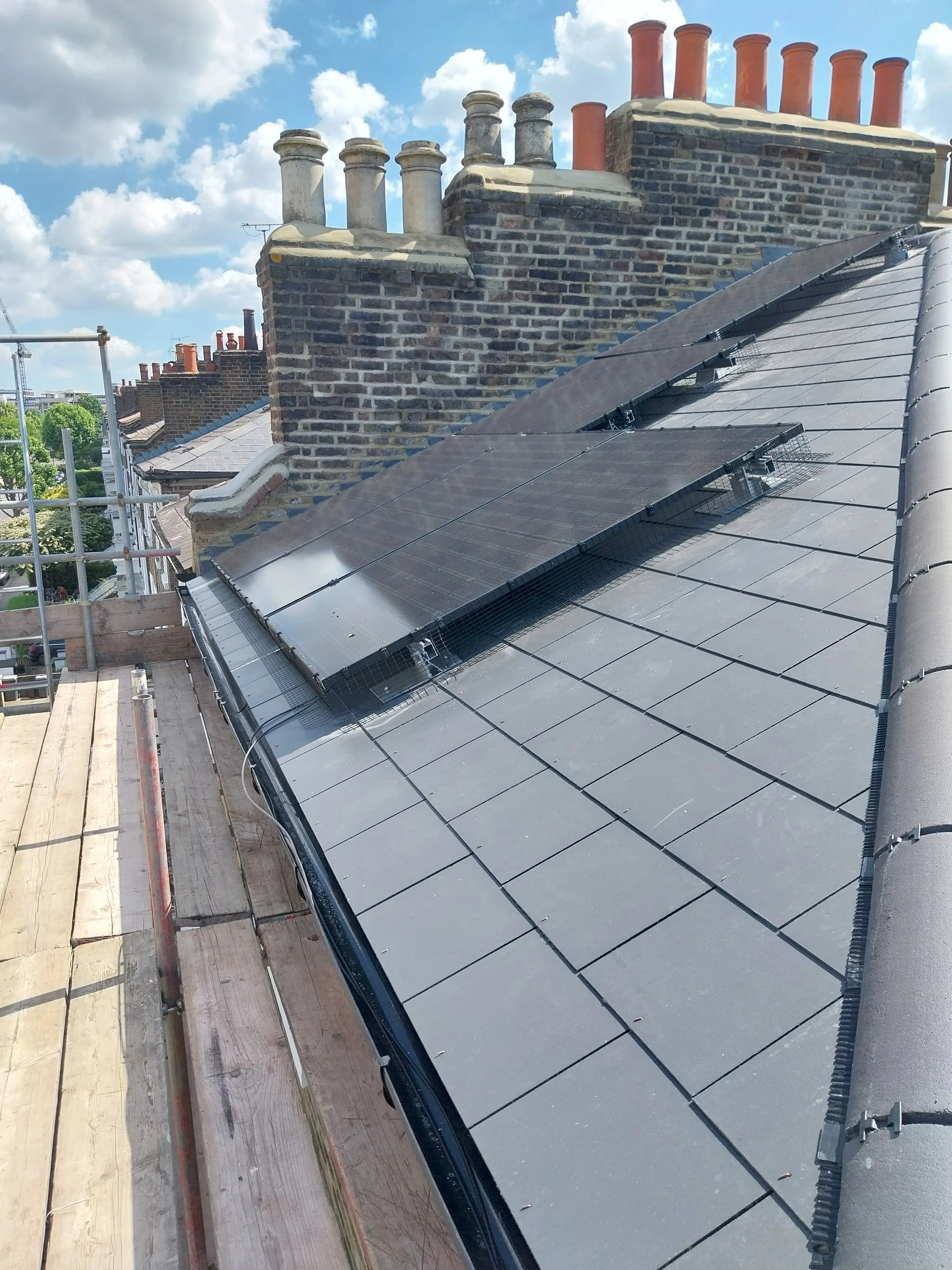 Tiled roof with solar panels.
