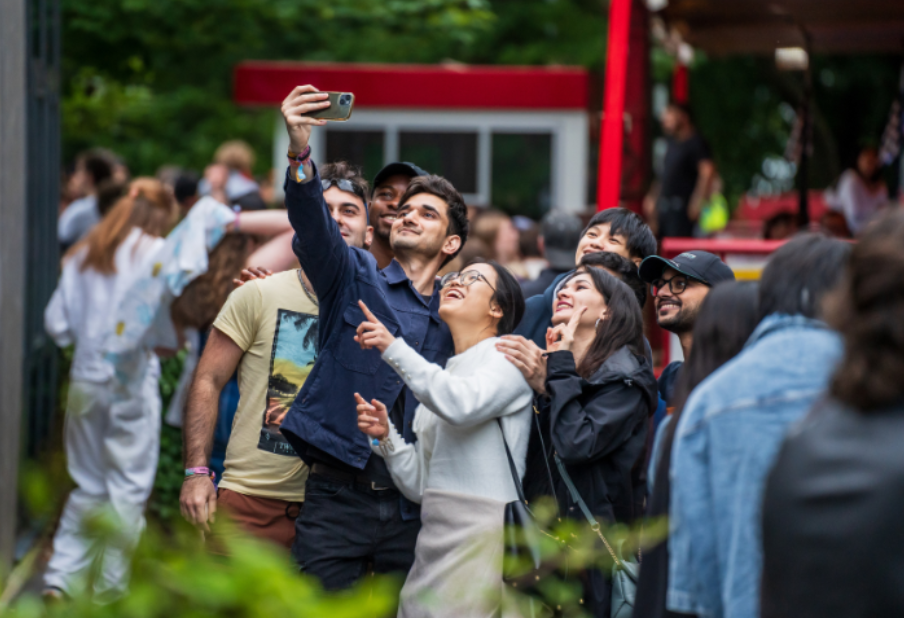 A group of friends taking a selfie at a Students' Union event.