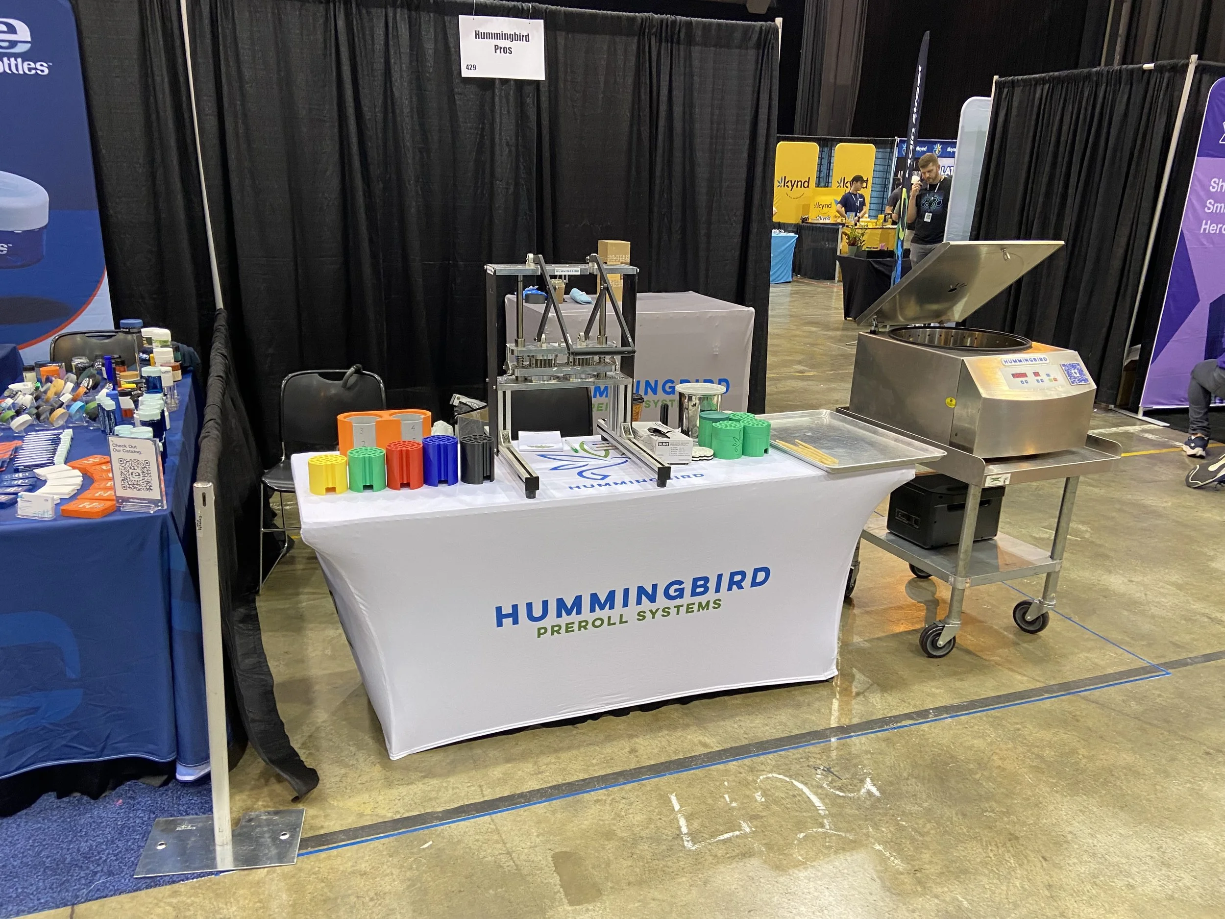 Hummingbird preroll machine and production tooling displayed at NECANN in Atlantic City, New Jersey