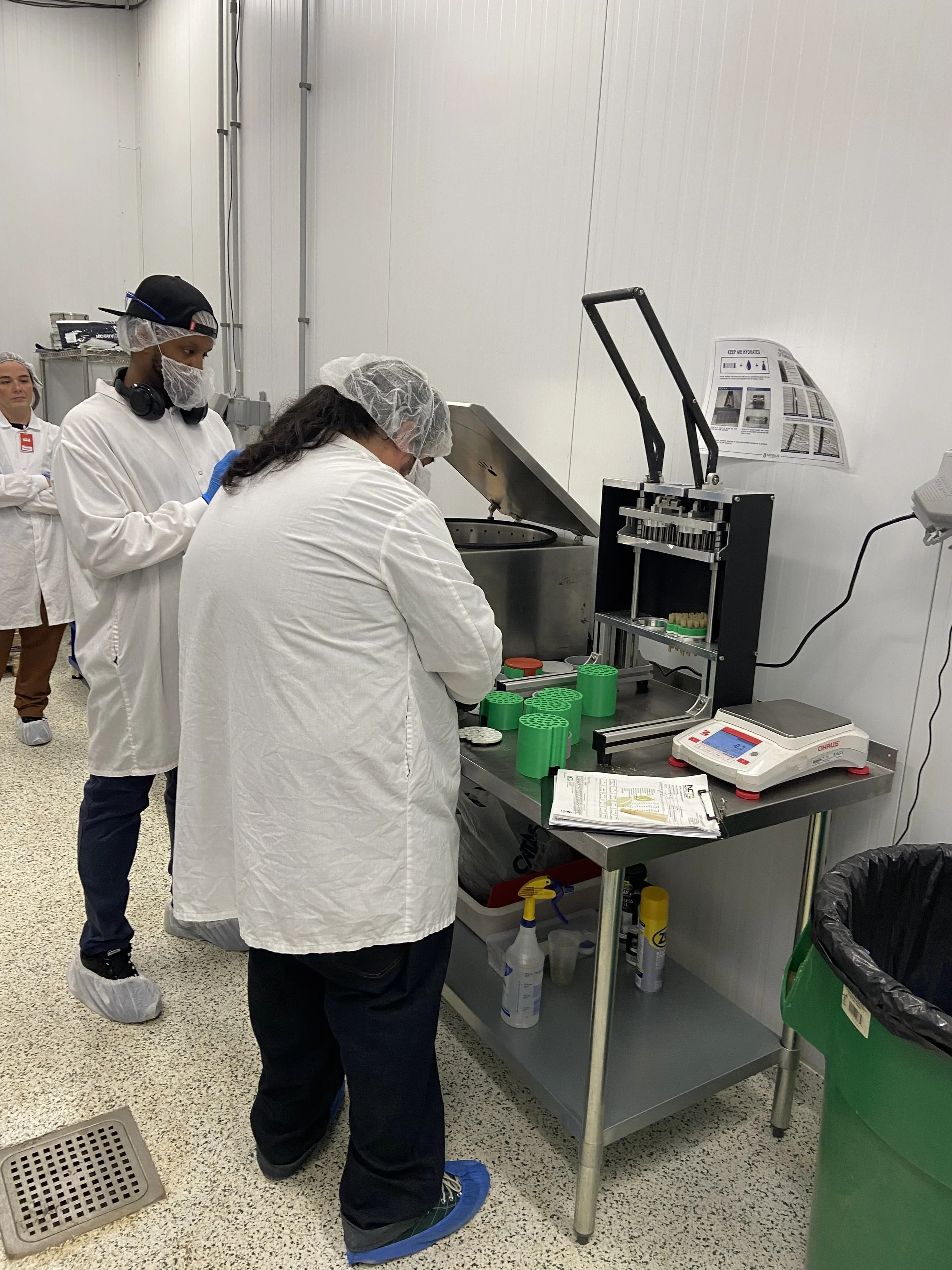 Hummingbird preroll manufacturing demonstration for cannabis operators at The Exchange in Detroit, Michigan