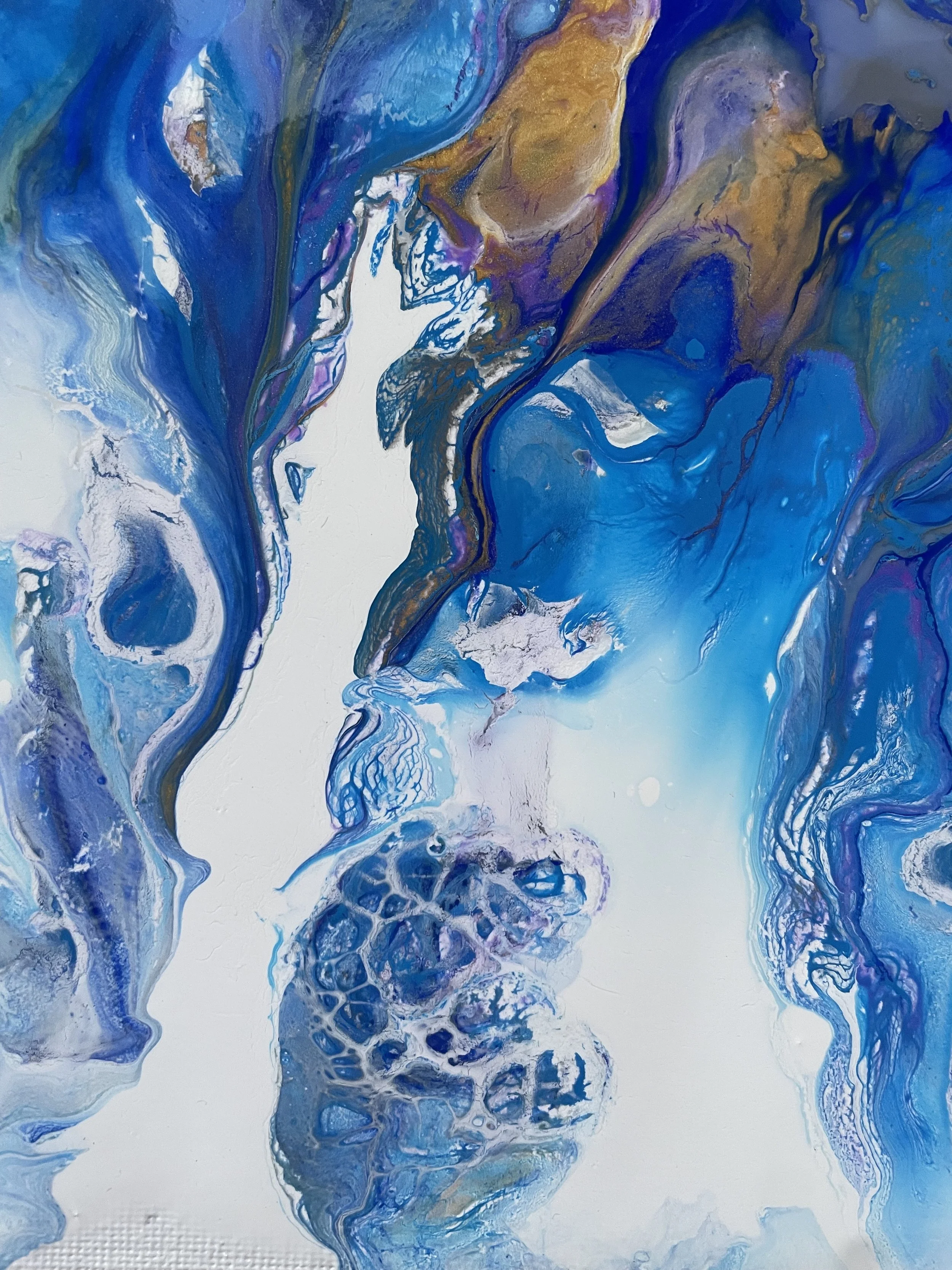 Abstract art featuring swirling blue, purple, gold, and white colors with fluid patterns and textures.