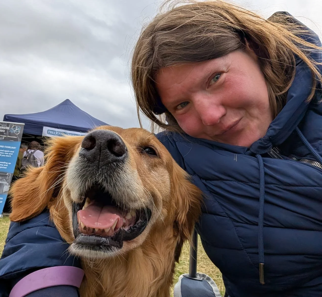 Charlie poses with a Golden Retriever