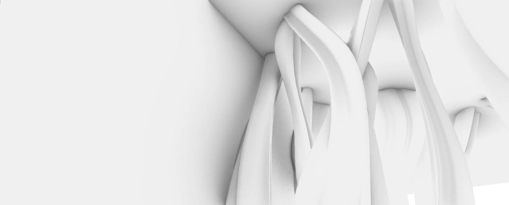 Close-up of a modern, abstract white sculpture with curved and intertwined shapes.