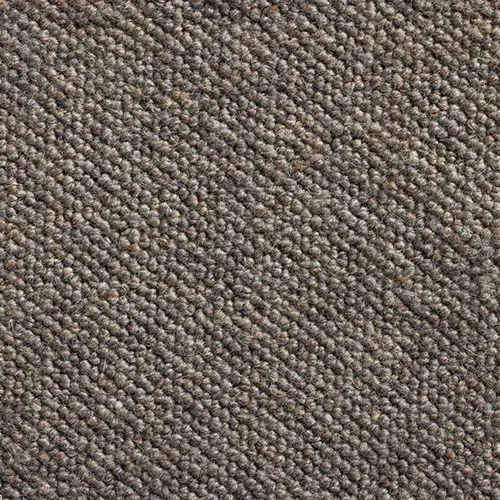 Close-up of a textured brown carpet with tightly woven fibers.