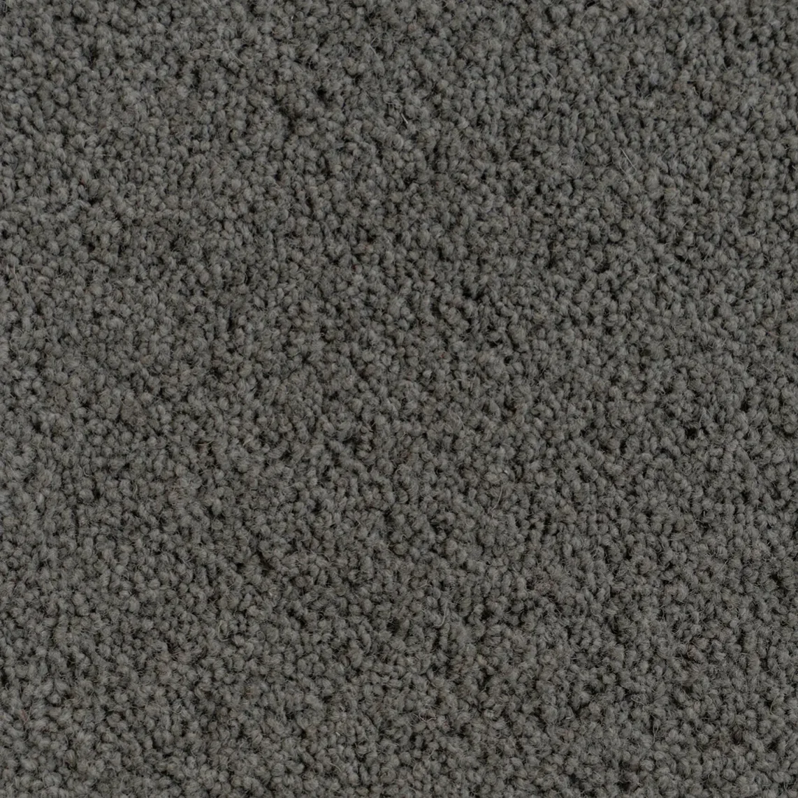 Close-up of gray textured carpet with a diamond pattern.