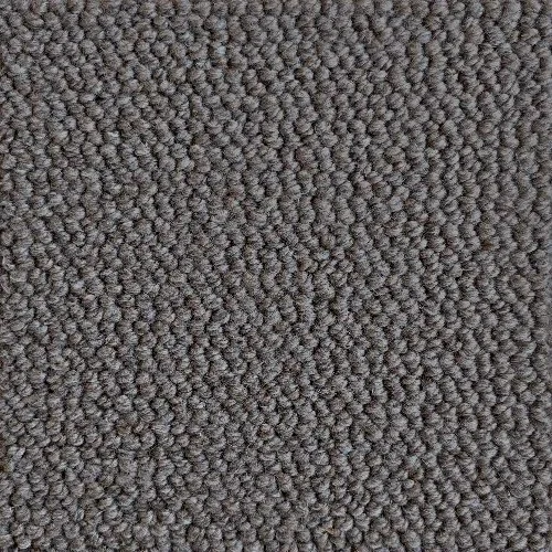 Close-up of a textured gray carpet with a dense, looped pile structure.