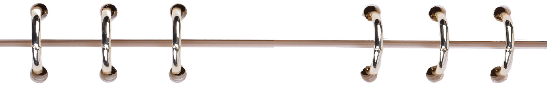 Close-up of a metal rack with six evenly spaced hooks, some hooks hold small black objects, and the rack appears to be mounted on a white background.