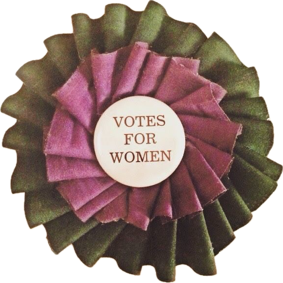 A ribbon featuring a circular center with the text 'Votes for Women', surrounded by layered pleated fabric in purple and green colors.