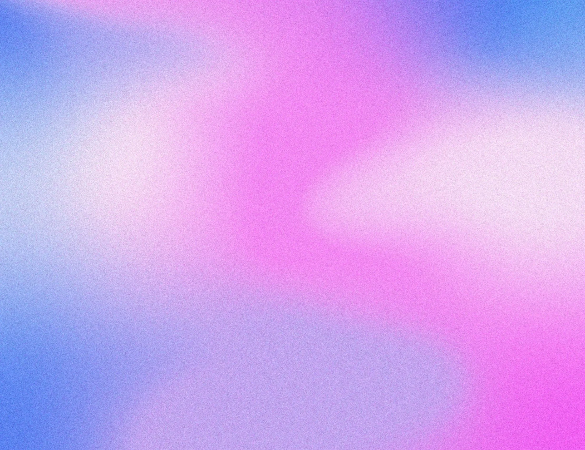 Abstract gradient background with soft pink, purple, and blue hues.