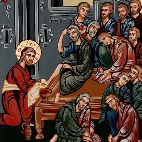 A religious painting of Jesus Christ with a halo, teaching a group of men and women seated on the ground, in a biblical setting.