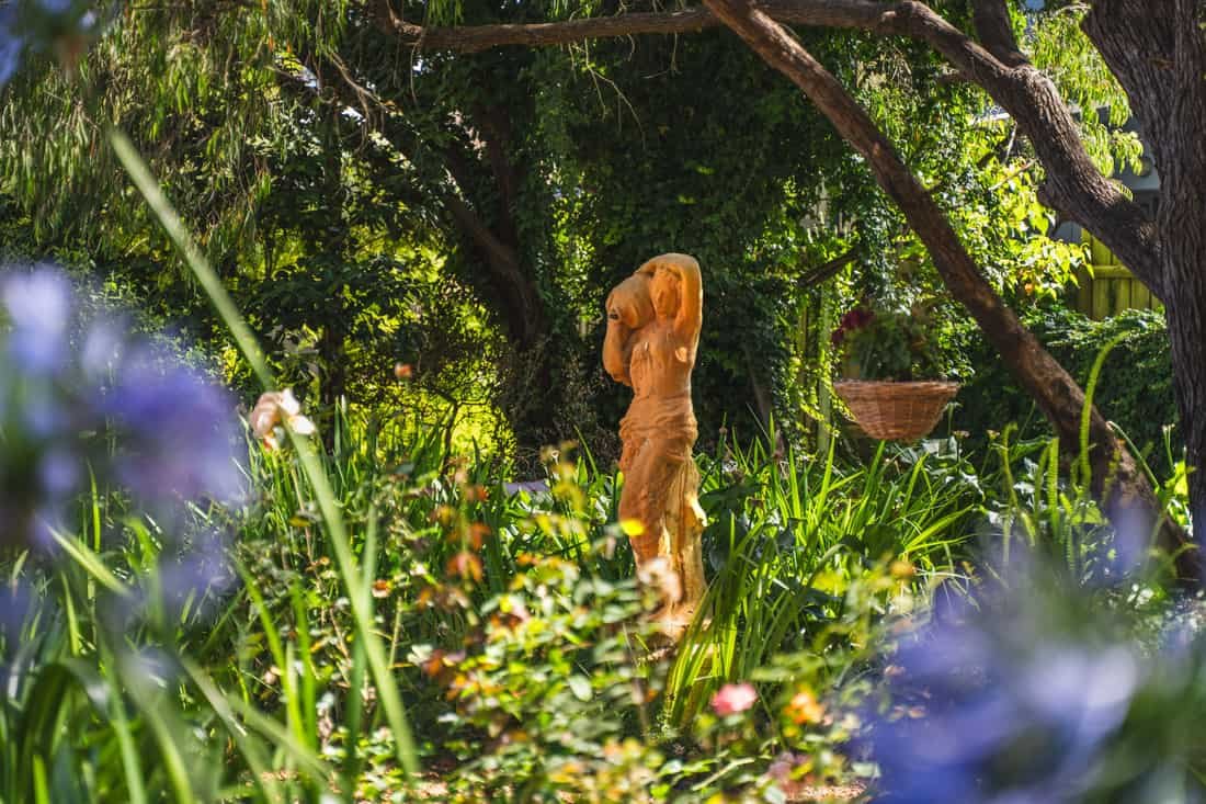 rosewood guesthouse garden statue
