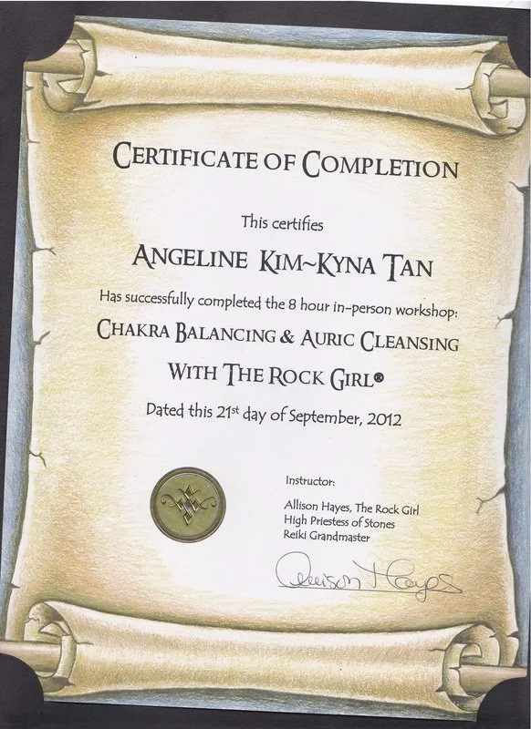 Certificate of Completion awarded to Angeline Kim-Kyna Tan for completing an 8-hour in-person workshop on Chakra Balancing and Auric Cleansing with The Rock Girl, dated September 21, 2012, signed by instructor Allison Hayes.