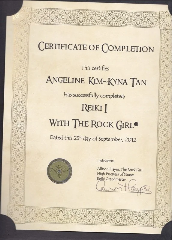 Certificate of Completion awarded to Angelene Kim-Kyna Tan for successfully completing Reiki I with The Rock Girl, dated September 23, 2012, signed by instructor Allison Hayes.