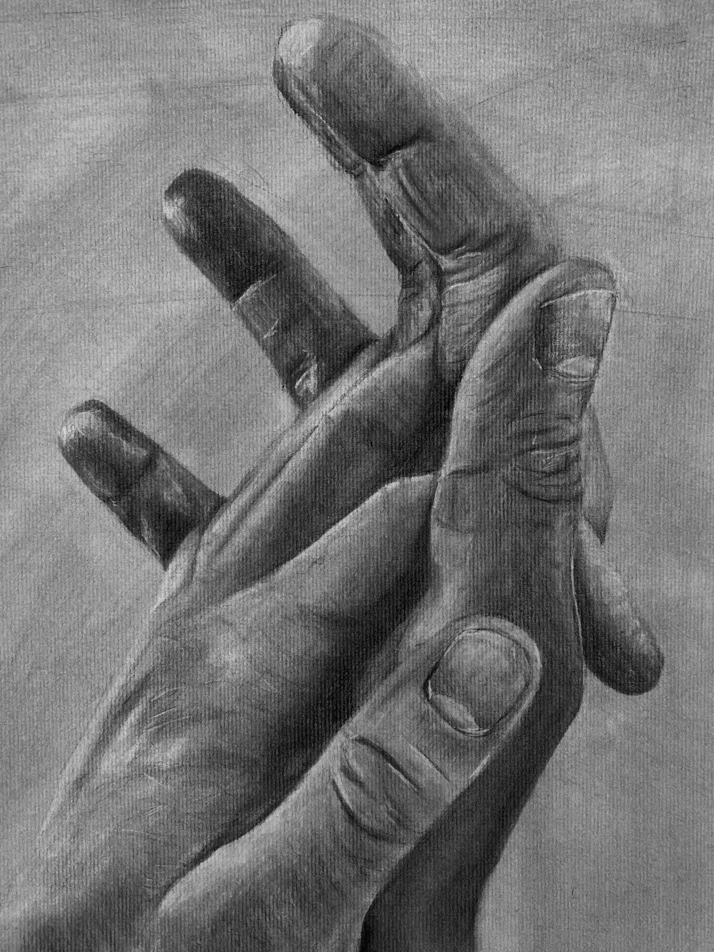 Entangled hands with a textured background.