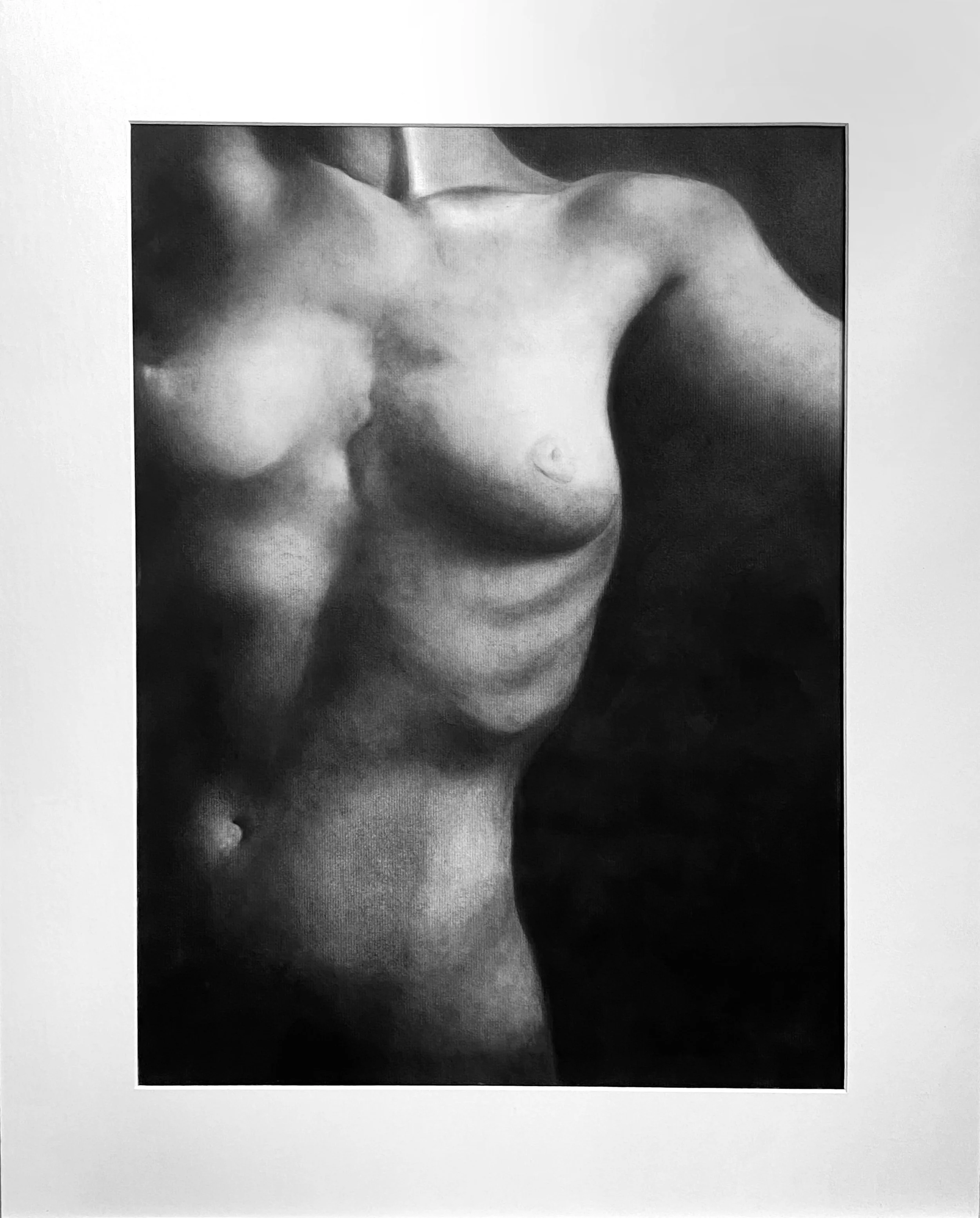 Black and white photograph of a female nude torso with detailed shading, displayed in an art gallery setting.