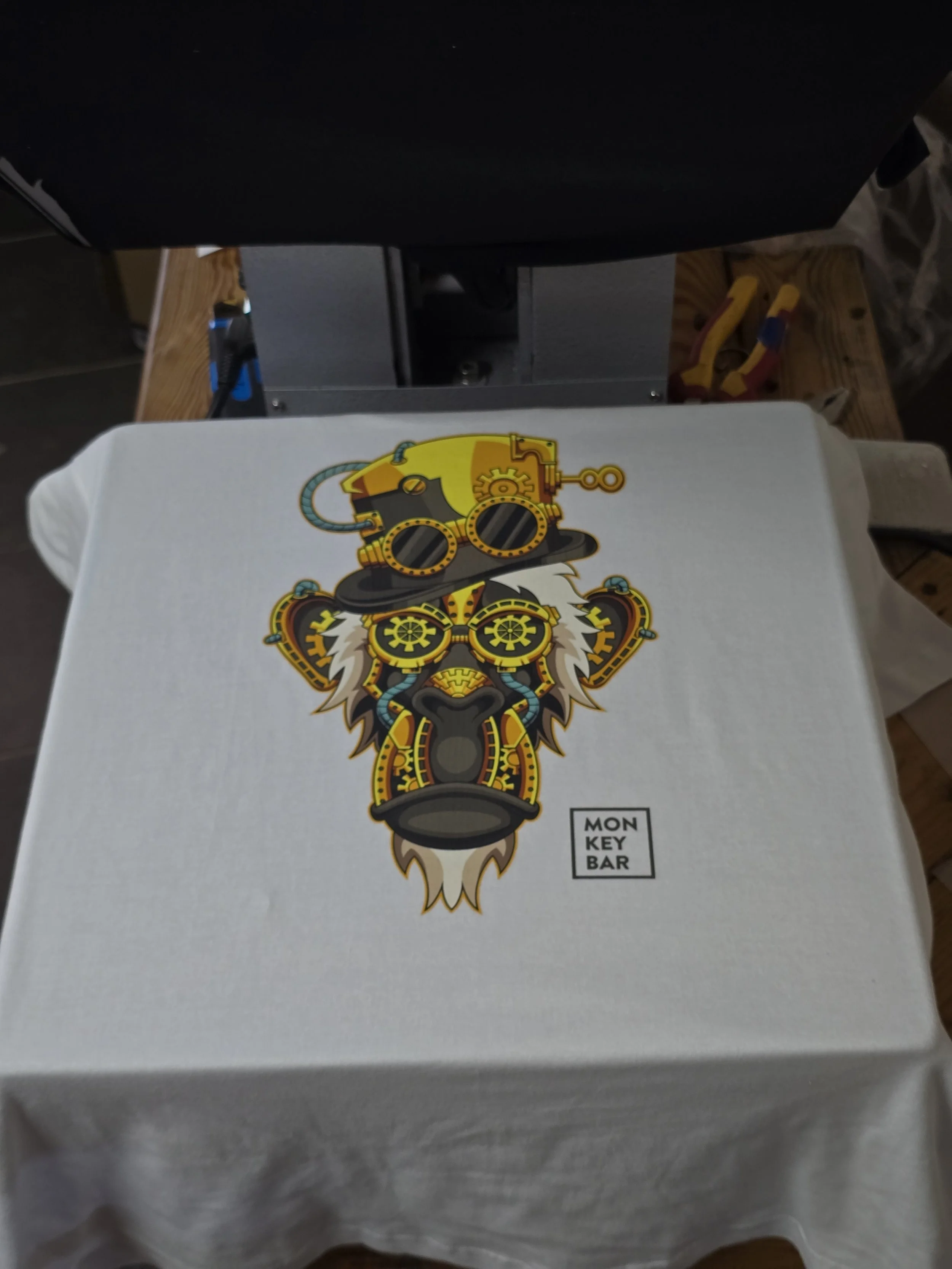 A white keyboard with a colorful, stylized lion with mechanical gears and sunglasses on it, and a label that says "Keyboard".