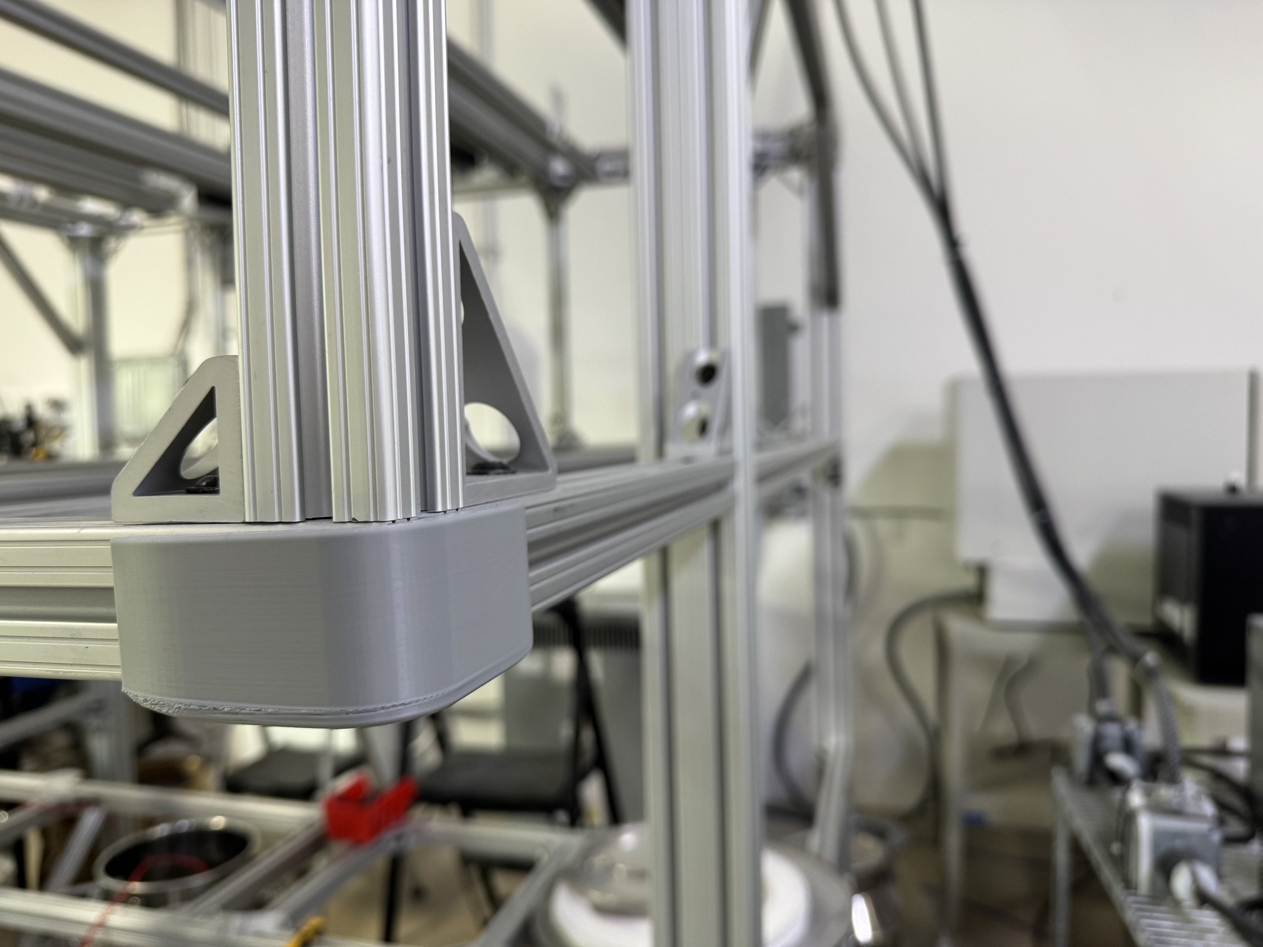 Northern Nitinol new heat treatment for Nitinol services and manufacturing, using automated salt bath system with conveyor and timers.