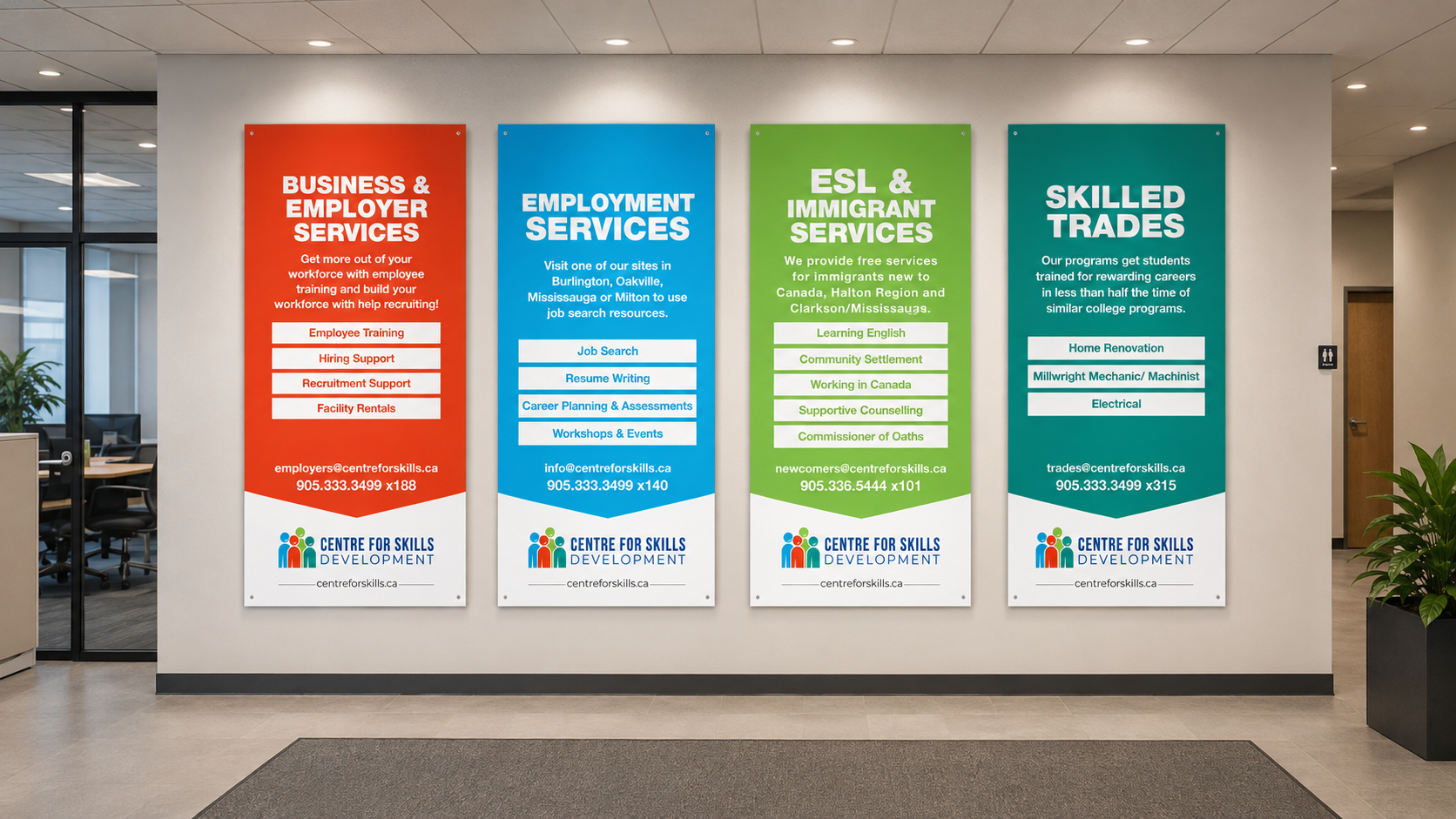 Four colorful banners listing workforce development services at the Centre for Skills Development, including business and employer services, employment services, ESL and immigrant services, and skilled trades programs.