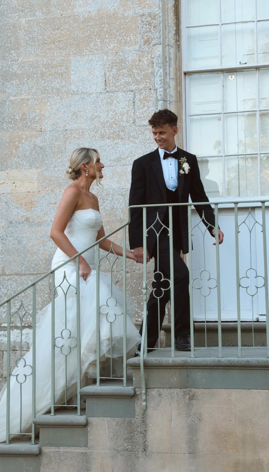 married couple on staircase