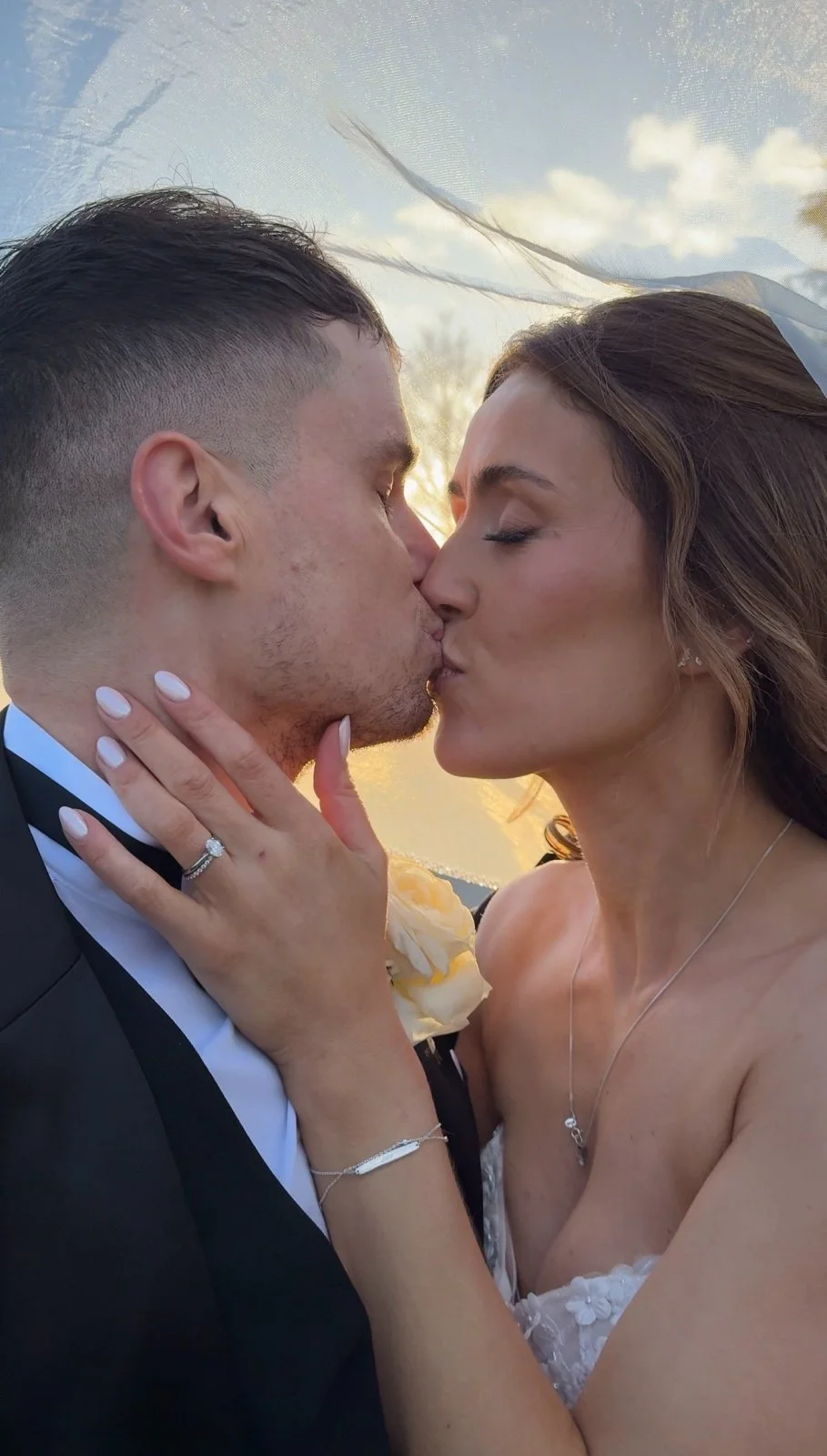 Kissing married couple