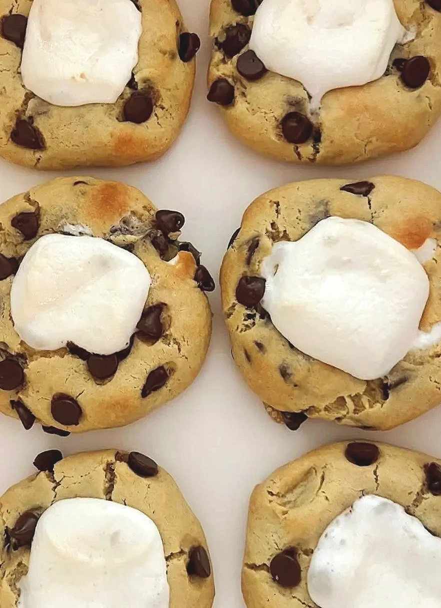 S'mores Cookie
-- 
A vanilla cookie baked on a crisp graham cracker base, stuffed with melty chocolate chips, and topped with a toasted jumbo marshmallow. Every bite is gooey, chocolatey, and tastes just like a campfire s'more—no fire required.