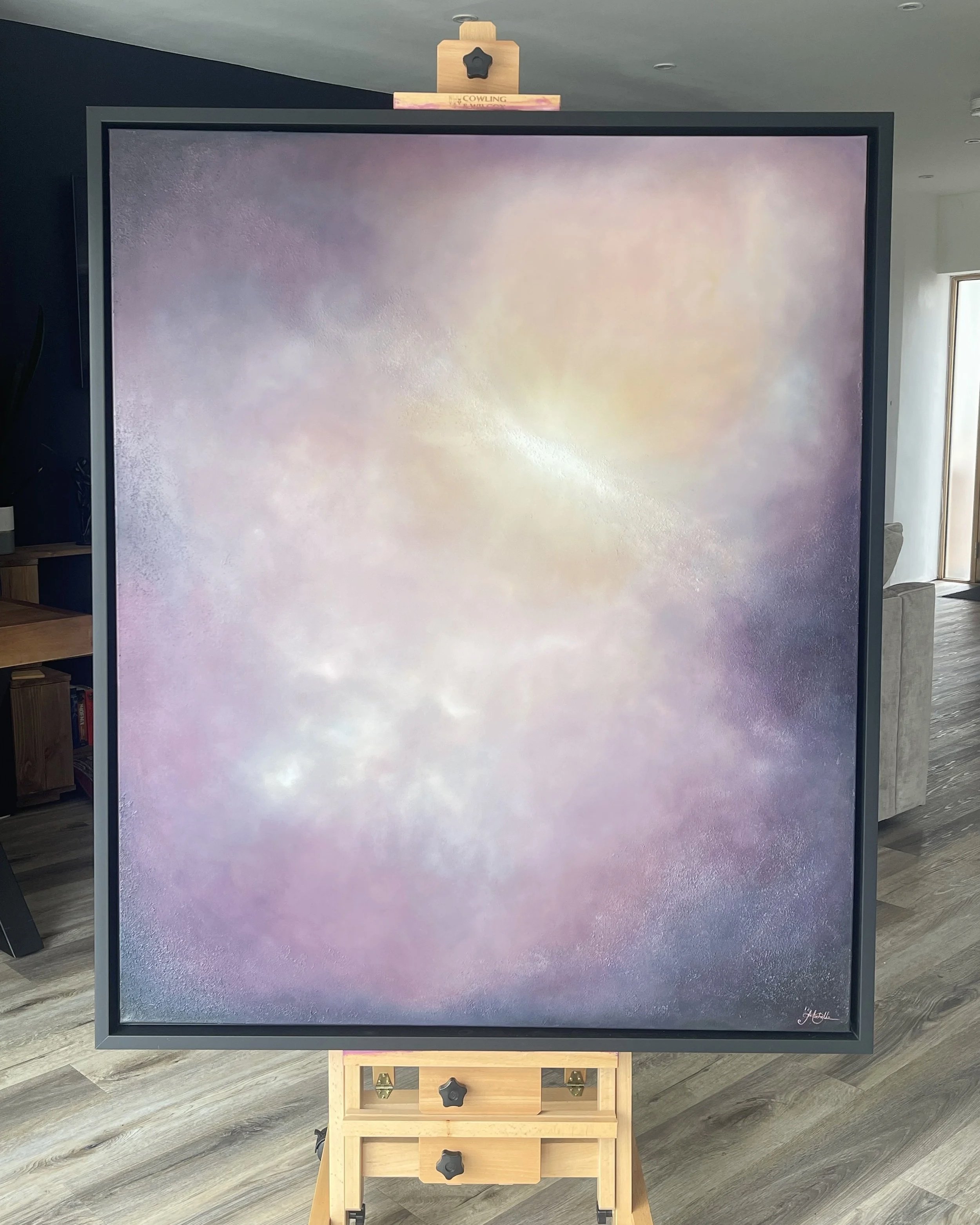 Attunement, atmospheric abstract oil painting by Mechelle Tebbs, featuring softly layered earthy pink, neutral and dark tones surrounding a gentle central light.