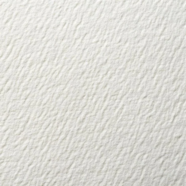 Close-up of a textured off-white or cream-colored paper or fabric surface.