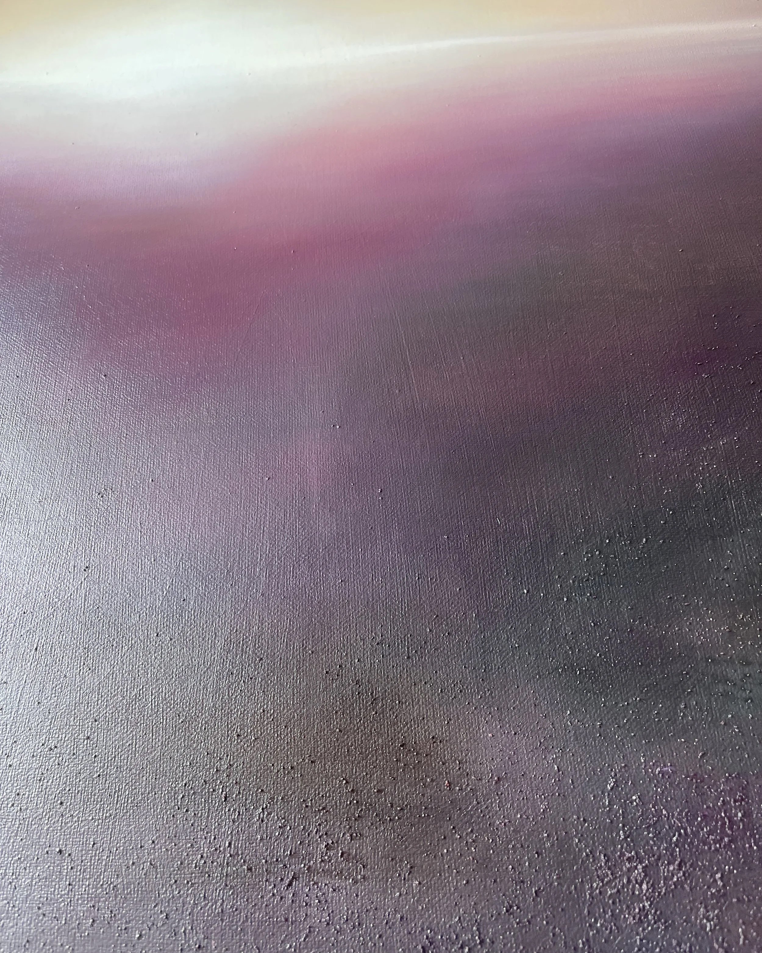 Close-up detail of Coming Home, showing layered plum tones, atmospheric texture and a softly illuminated horizon.
