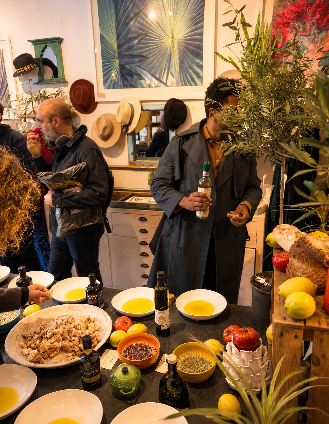 Guests enjoying a guided extra virgin olive oil tasting with Monsieur Bou.